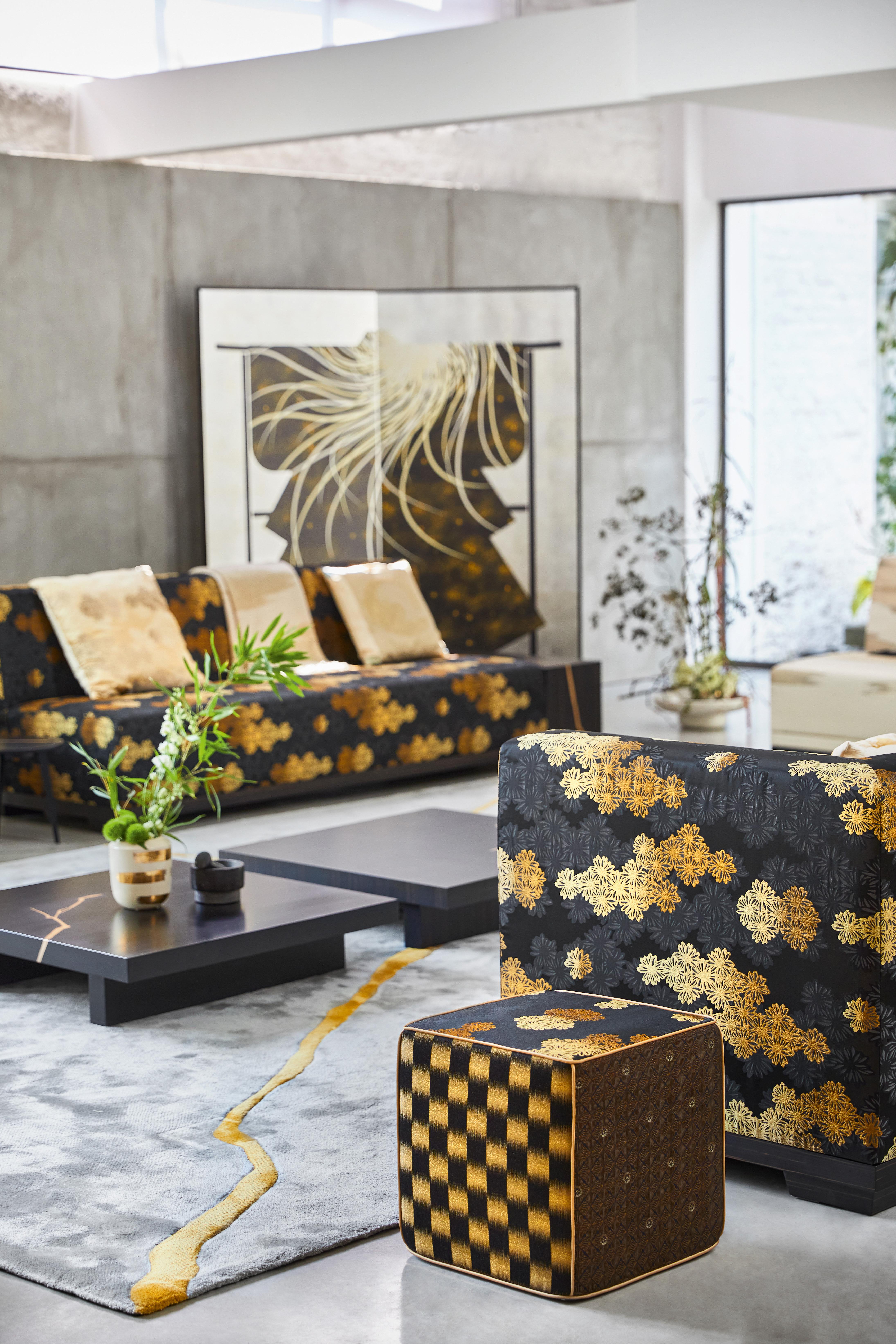 Crafted by the collaborative vision of K-3 and its iconic founder Kenzo Takada, this exquisite two-panel screen is a masterful blend of traditional Japanese artistry and modern design elements. Adorned with striking prints on silver leaf panels and