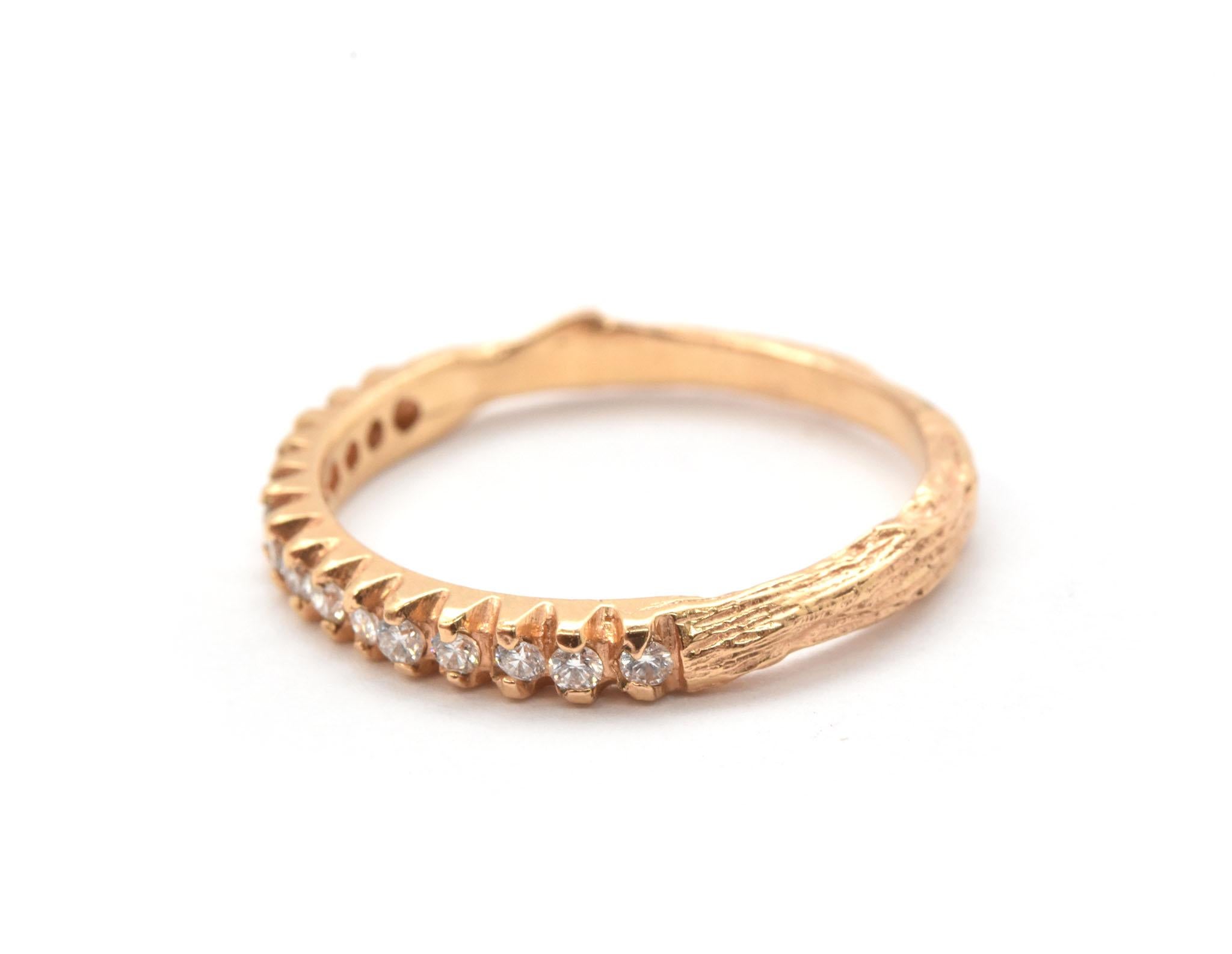 This ring is made in 18k rose gold by K. Brunini for the Twig collection. The ring is set with round diamonds for a total weight of 0.25ct. The ring measures 3mm wide, and it weighs 1.9 grams. 

Retail value: $2,050.00
