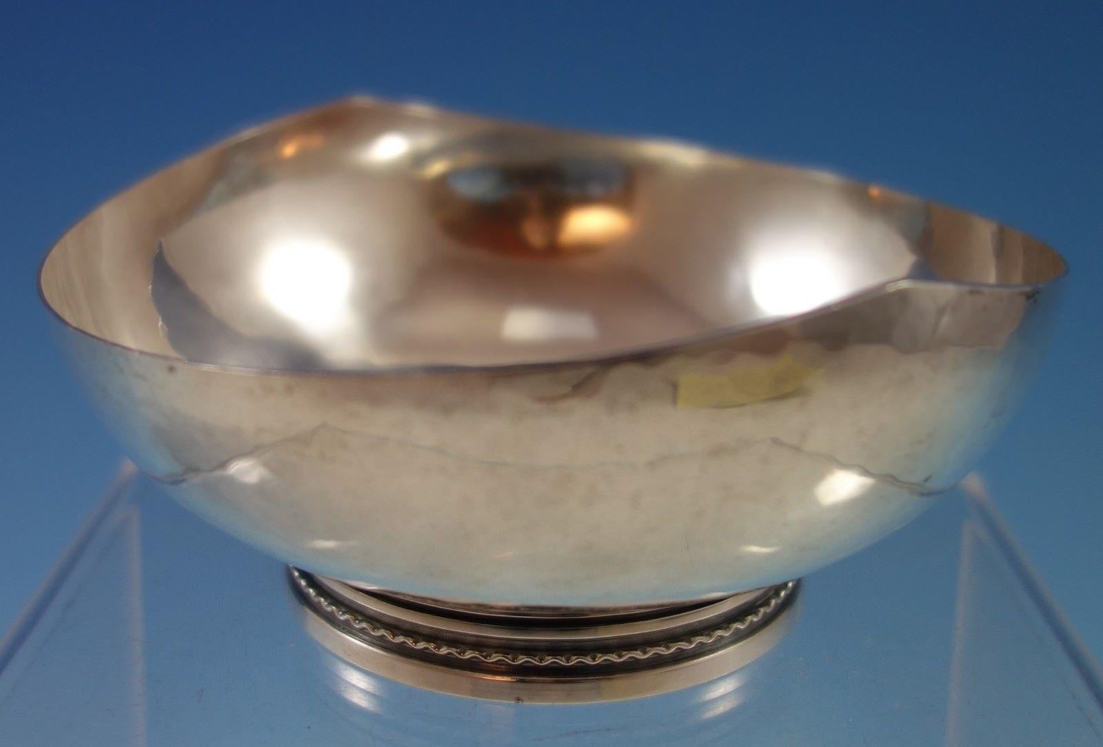 K. G. Markstrom's Swedish .830 silver small oval bowl. The bowl is hand-hammered, and it's dated 1960. The bowl measures 2 x 4 1/2 x 4 1/2, and it weighs 4.8 ozt. It is has an inscription (see photo), and is in excellent condition.
