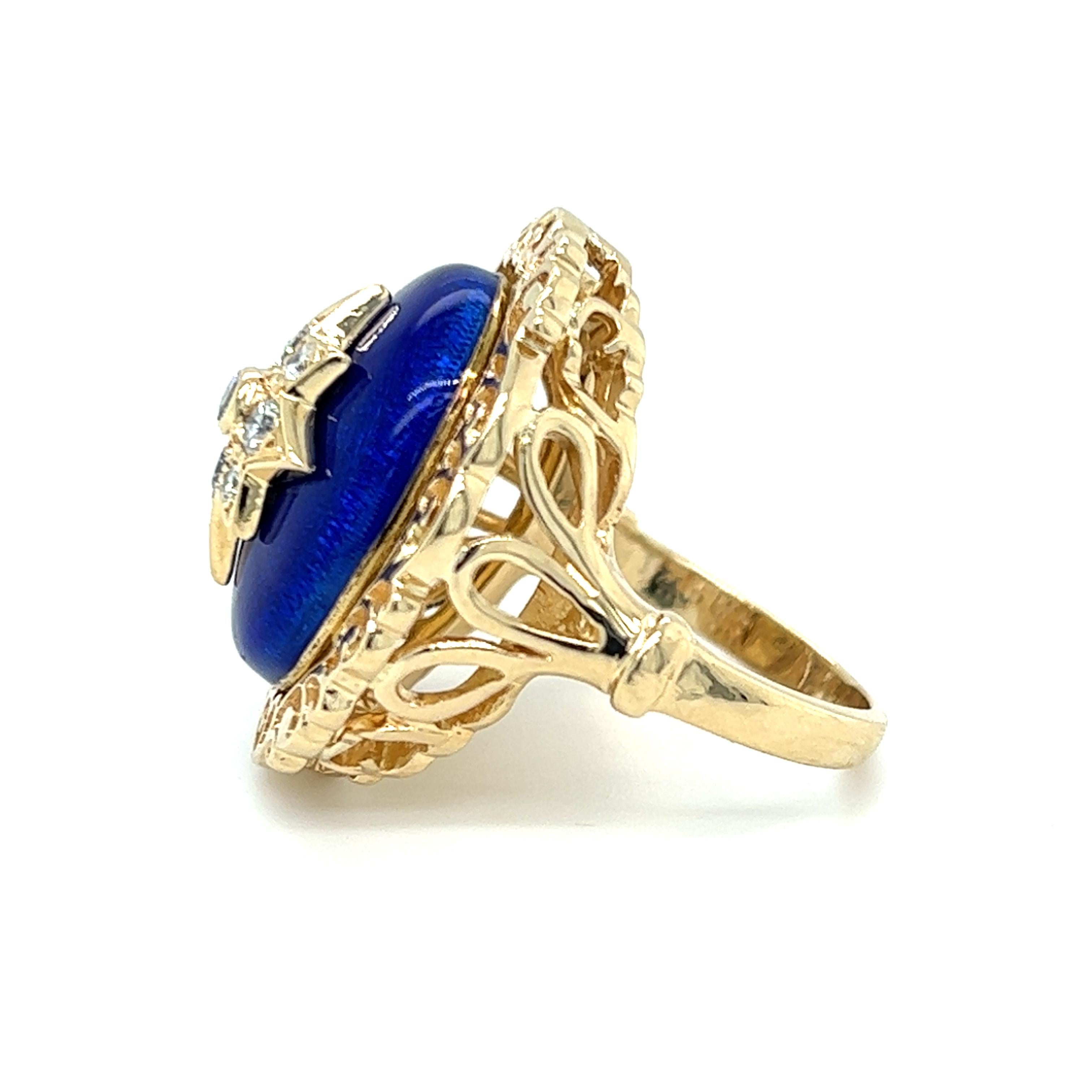 One 14 karat yellow gold cobalt blue enamel oval dome ring, designed by K. Goldschmidt The ring is set with nine (9) brilliant cut diamonds, approximately 0.25 carat total weight with matching H/I color and SI1 clarity. The ring is stamped 14KP with