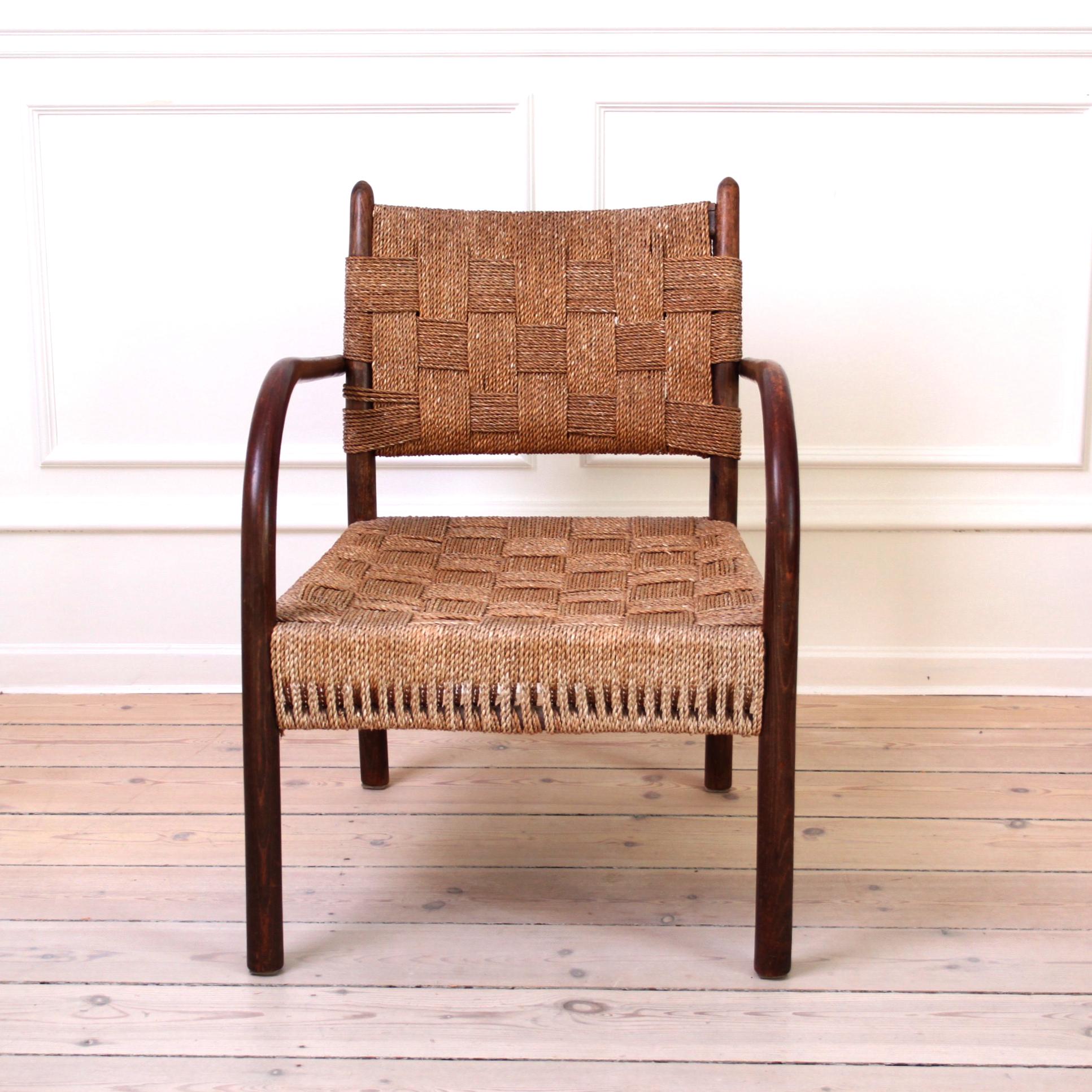 K. Scroder and Fritz Hansen - Denmark - Mid-Century Modern Design

Stained beech armchair with woven seagrass seat and back. 

Model 1459. 

Manufactured by Fritz Hansen, 1938

Until very recently this rare and sought after armchair was