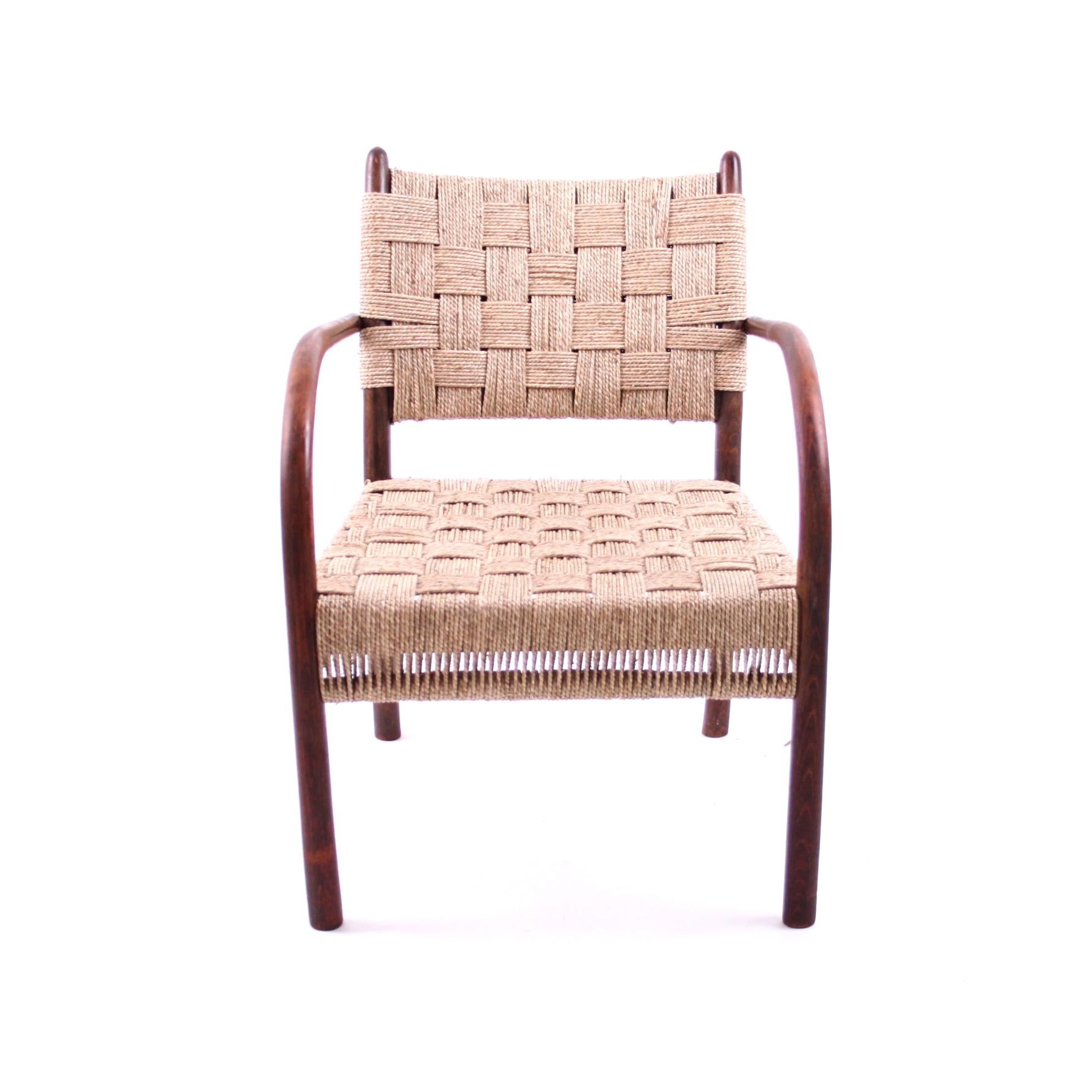 Karl Scröder & Fritz Hansen - Scandinavian Modern design

Beautiful and rare armchair in stained beech and woven seagrass seat and back. 

Model 1459. Manufactured by Fritz Hansen, 1938. 

Until very recently this rare and sought after armchair was