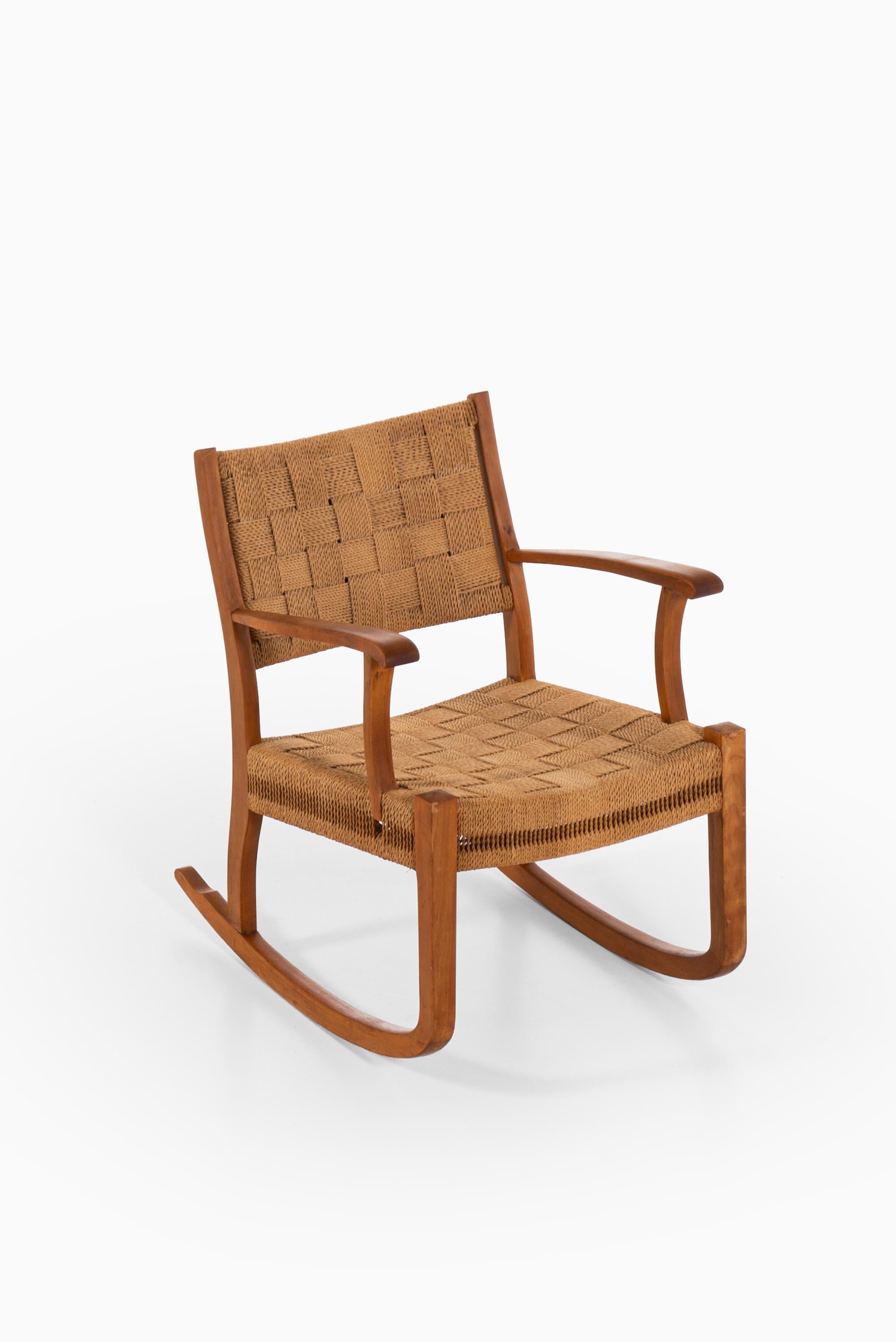 Rocking chair in beech and hemp string attributed to K. Scröder. Probably produced by Fritz Hansen in Denmark.