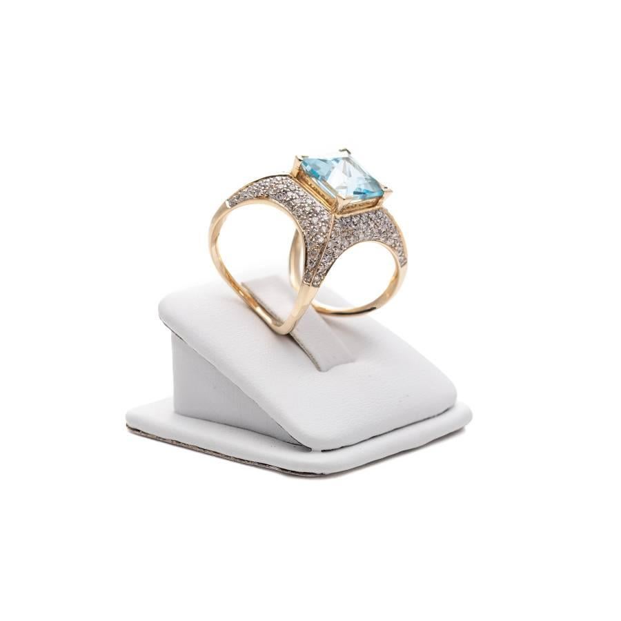 Ring made of 14K yellow gold, inlaid with a tanzanite and 124 diamonds having a total of 1.17ct. Size: 58. Size of this product cannot be adjusted. The product comes with an AGS Jewelry certificate of conformity, which includes details about the