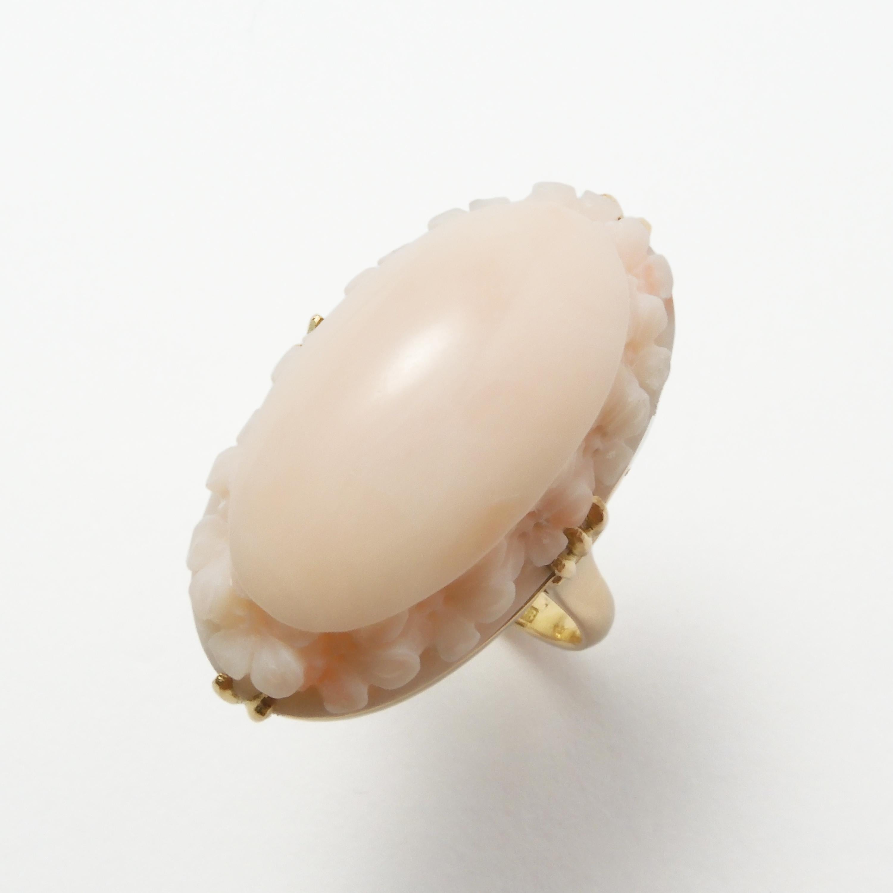 This coral is collected in the deep sea off the Midway Islands. This large size coral is rarely seen now. There are almost no scratches and the piece is in perfect condition. The pale pink color mixed with white shows the genuine characteristics of
