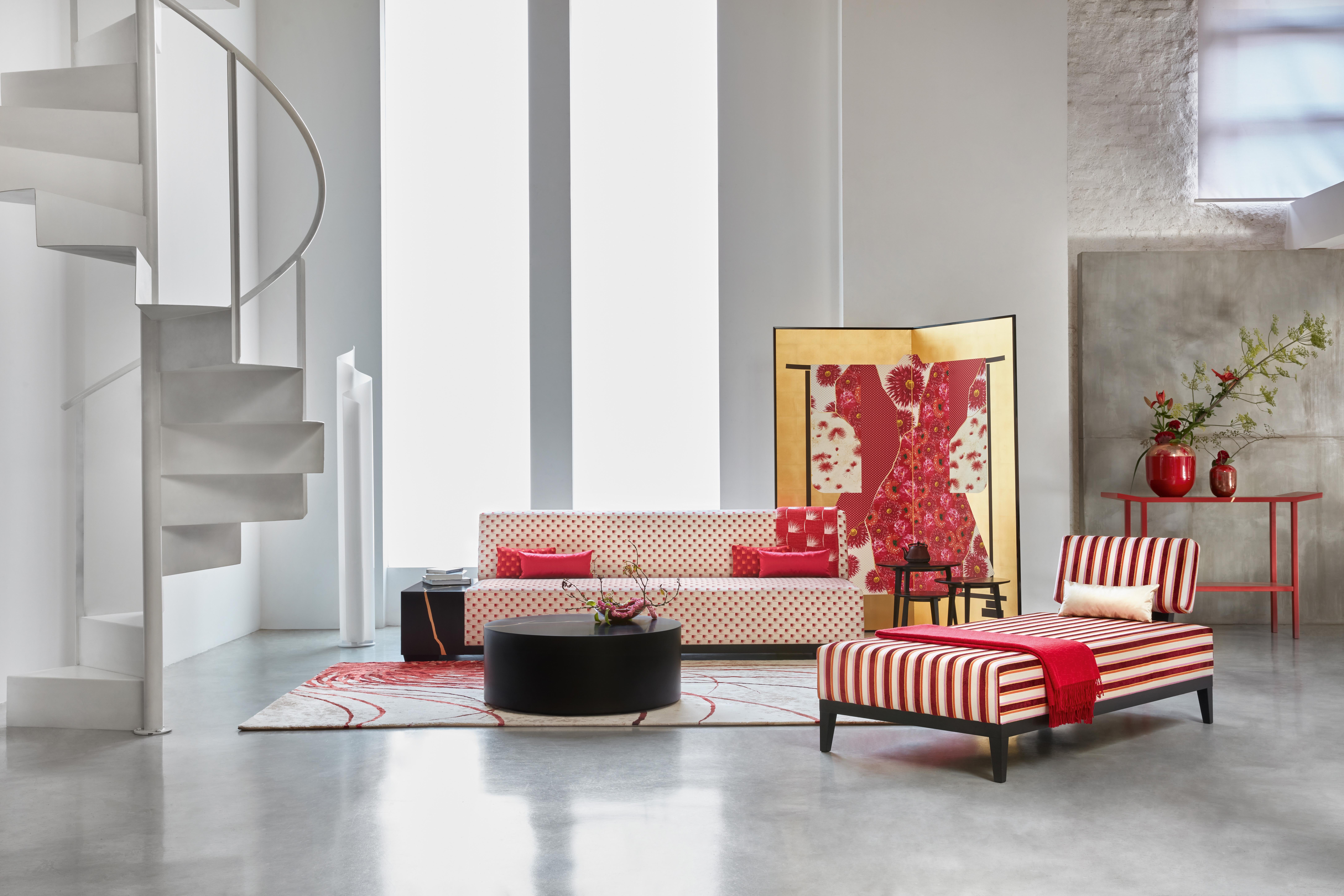 This exquisite rug, crafted by K3 under the visionary direction of founders Kenzo Takada and Jonathan Bouchet Manheim, showcases a stunning, oversized red chrysanthemum design. Merging elegant simplicity with bold graphic elements, this magnificent