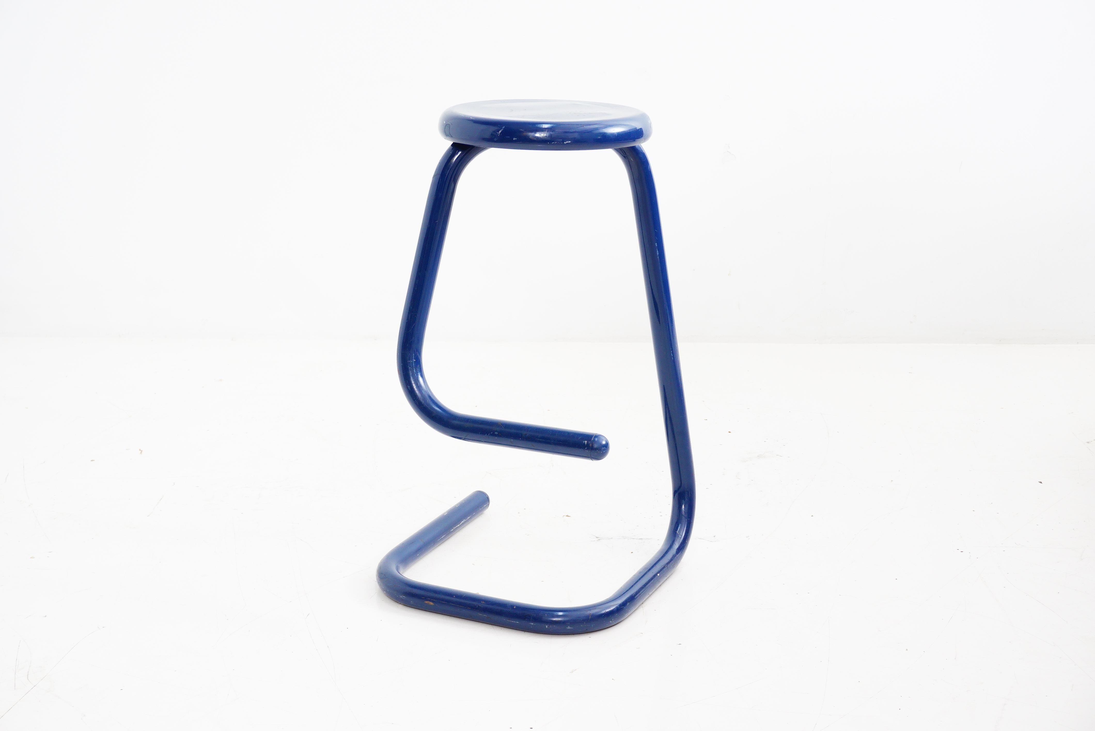 Elevate your seating game with our dark blue bar stool that's basically a paperclip showing off its gym gains. Who knew office supplies could be so stylish? Pull up a conversation starter and toast to design that's bending all the rules.

- 28