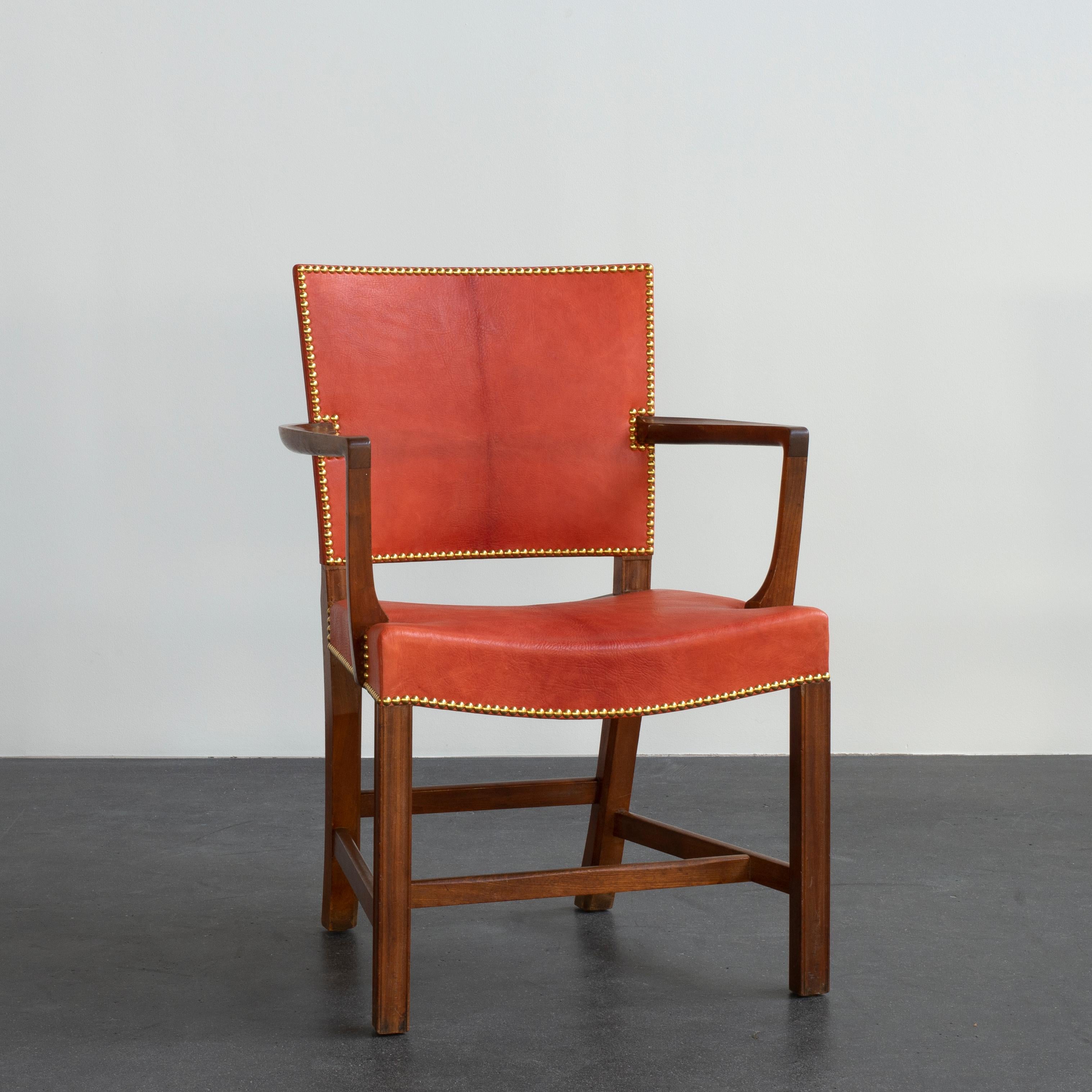 Kaare Klint 'red chair' in Cuban mahogany. Upholstered with Niger leather and brass nails. Executed by Rud. Rasmussen, 1934-1938.

Underside with manufacturer's paper label RUD. RASMUSSENS/SNEDKERIER/45 NØRREBROGAD/KØBENHAVN, pencilled serial