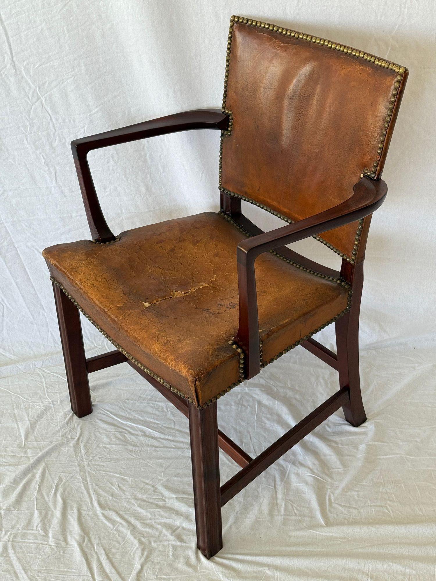 Kaare Klint Armchair Designed in 1927 and produced by Rud Rasmussen. Mahogany frame. Marked with Rud Rasmussen and Kaare Klint's label.