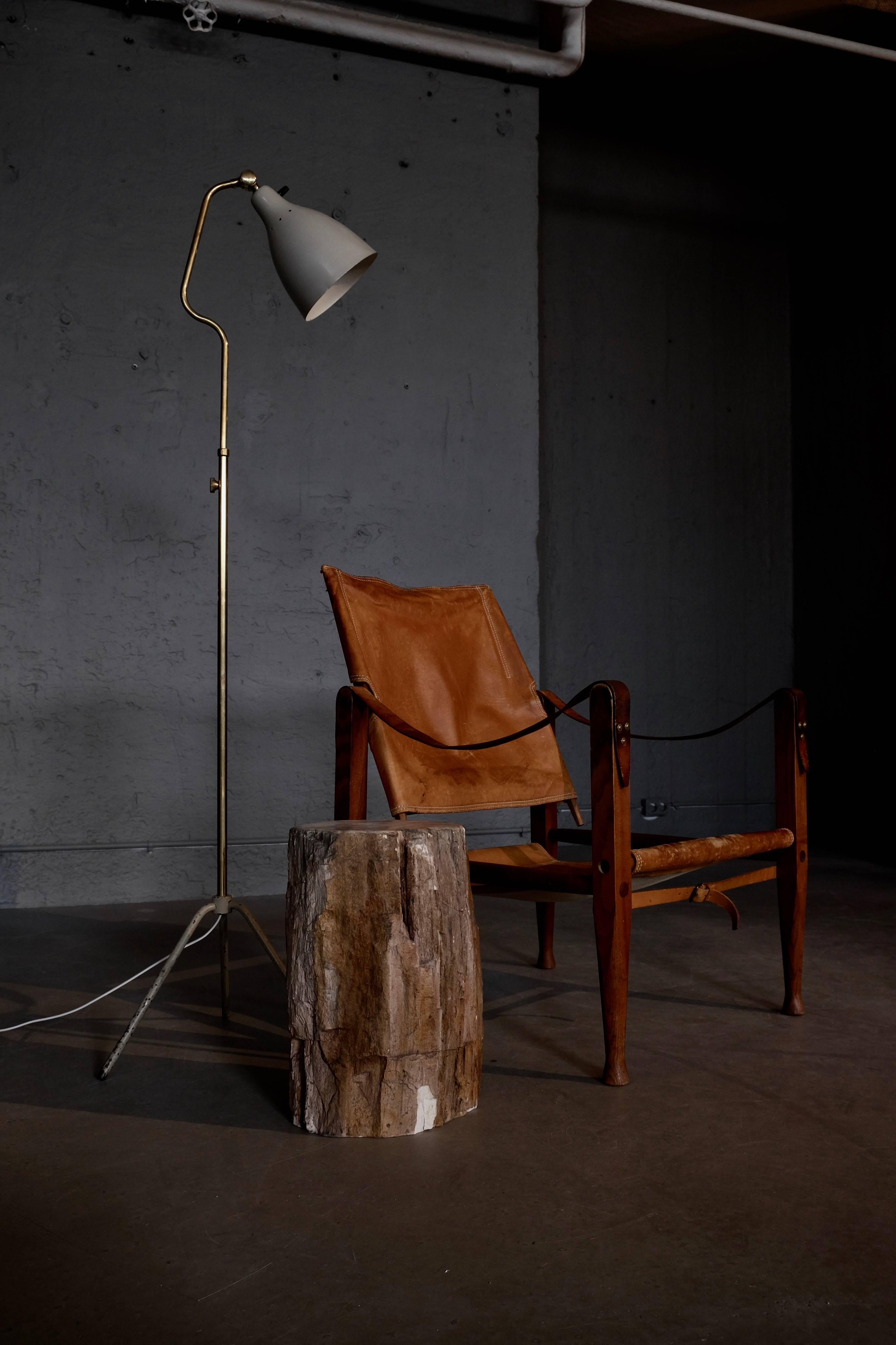 Safari chair with patinated cognac brown leather. Designed by Kaare Klint in 1933, produced by Rud. Rasmussen, Denmark.
Global front door shipping (within 7 days): USD 99.
