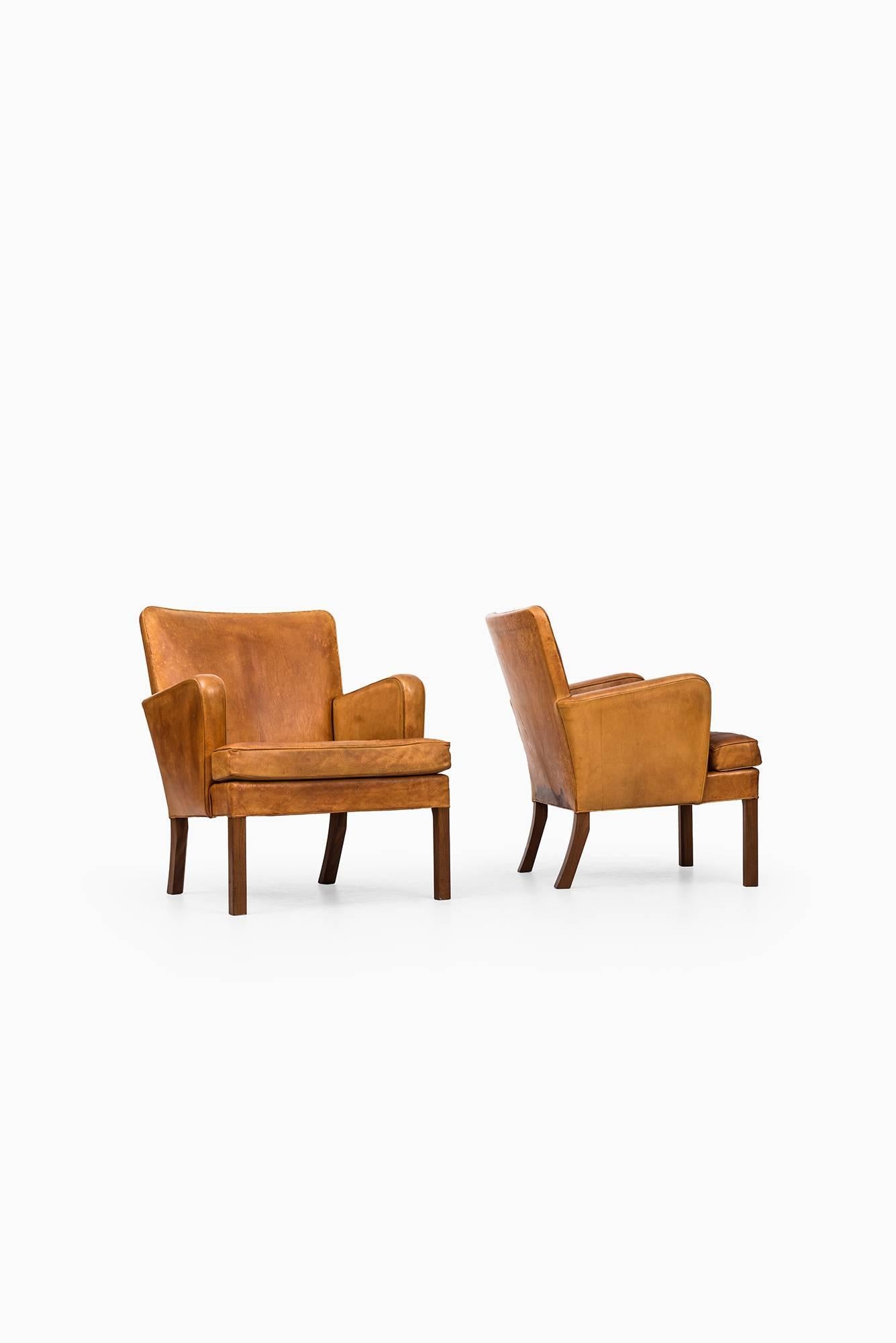 Danish Kaare Klint Easy Chairs Model 5313 by Rud. Rasmussen Cabinetmakers in Denmark