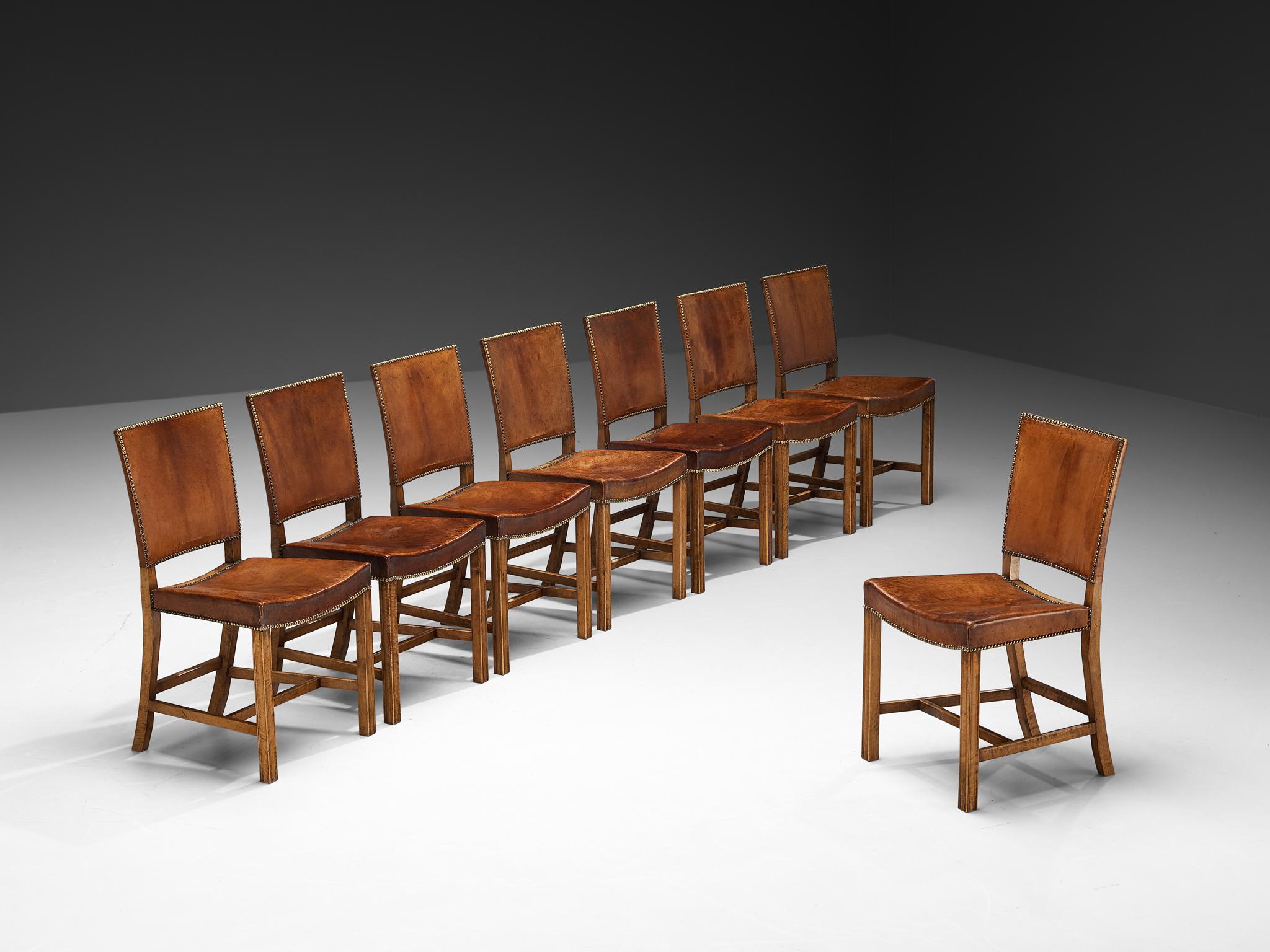 Kaare Klint per Rud. Rasmussens Snedkerier, set di otto sedie da pranzo, modello '3949' in pelle, mogano, ottone, Danimarca, design 1933, prodotto 1930

Queste sedie da pranzo in pelle marrone cognac e mogano sono state disegnate nel 1933 e