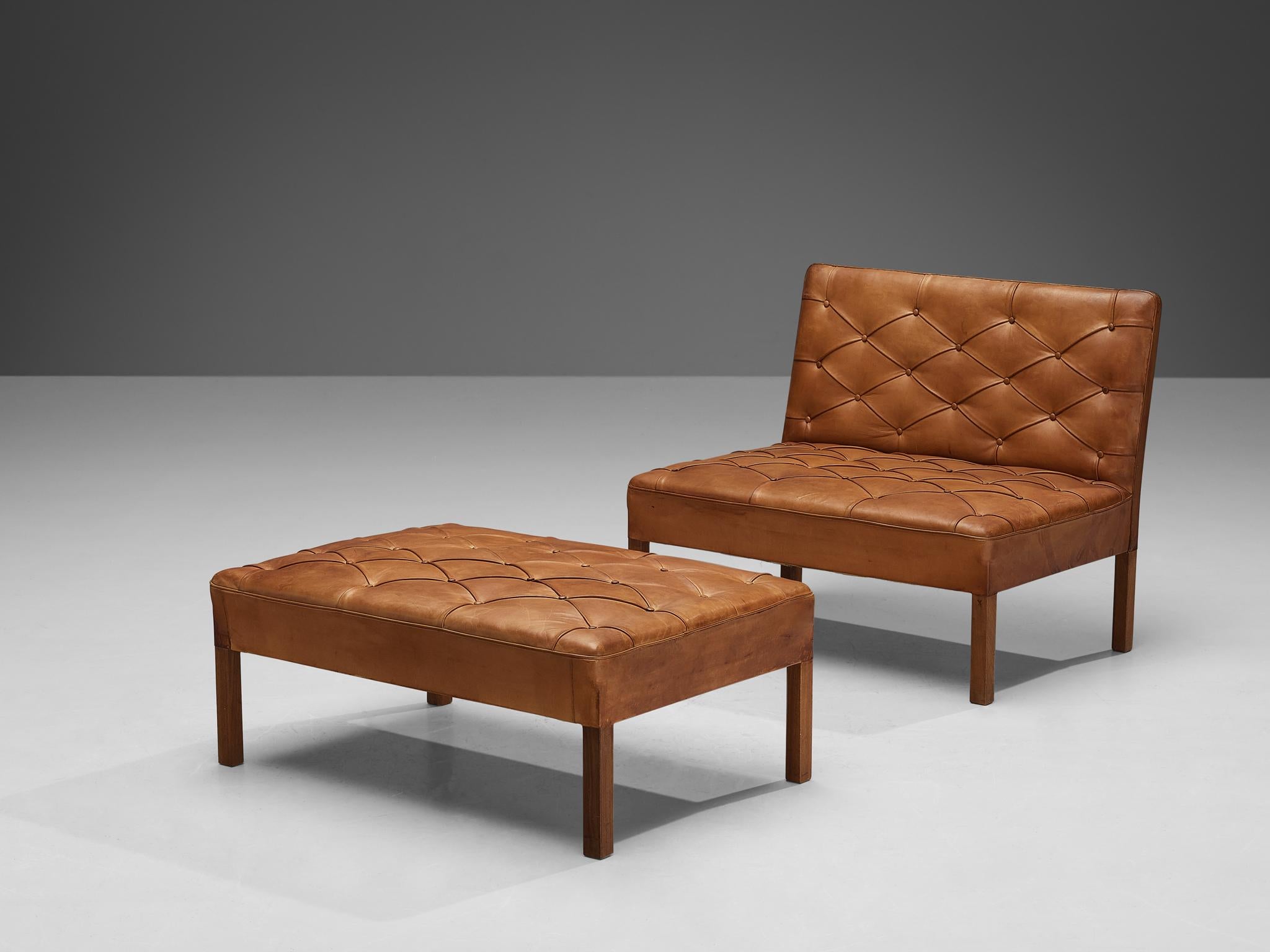 Kaare Klint for Rud Rasmussen, 'Addition', model ‘4698’ sofa and ottoman, leather, mahogany, Denmark, design 1933, production afterwards

This set consisting of a 'Addition' sofa and ottoman are designed by Kaare Klint for Rud Rasmussen and were