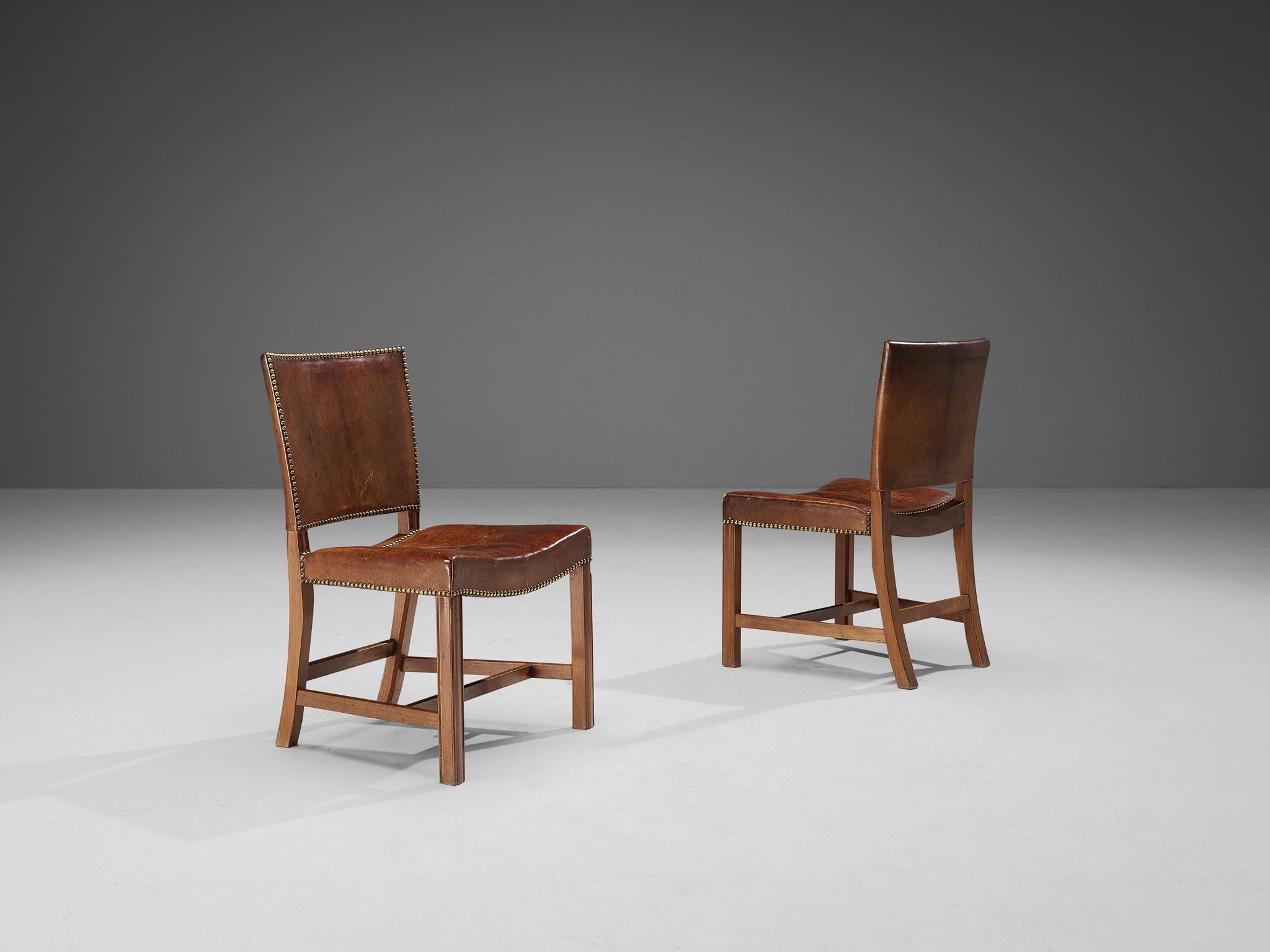 Kaare Klint for Rud Rasmussen, pair of dining chairs, 'The Red Chair', model 3758, original Niger leather, mahogany, brass, Denmark, designed 1927, manufactured 1930s

These dining chairs in brown leather upholstery are designed in 1927 and