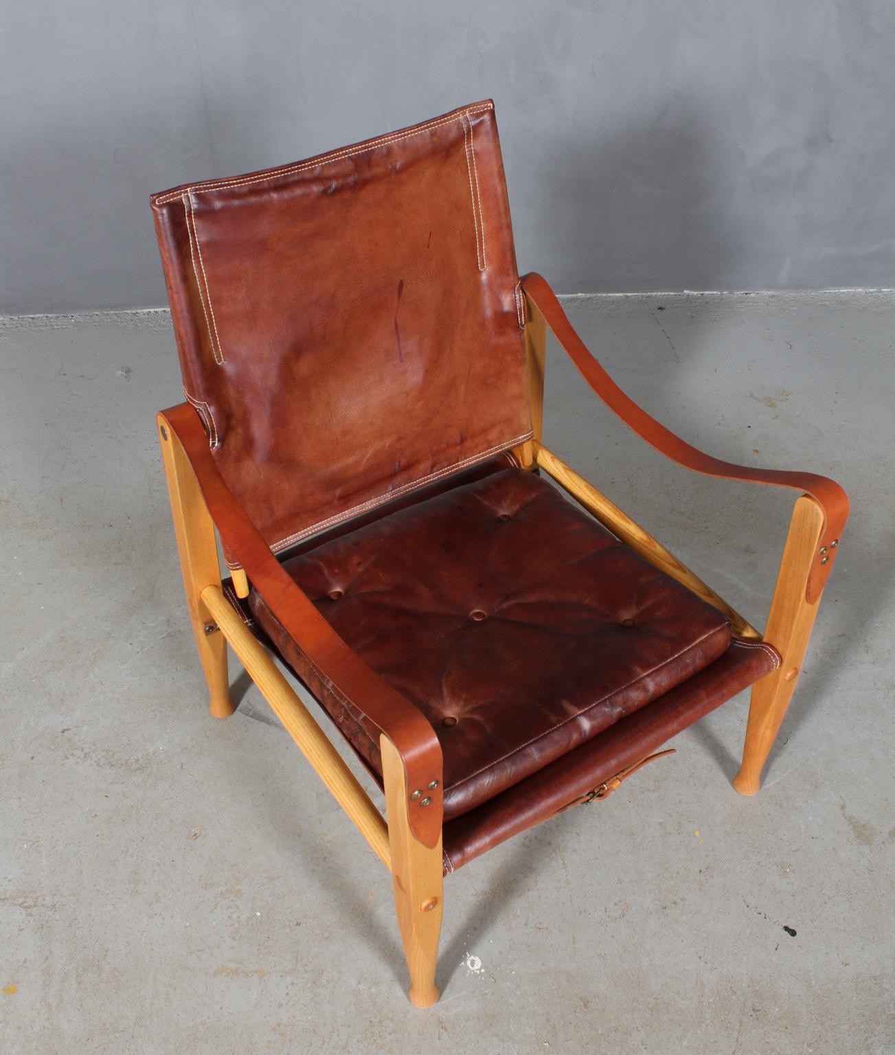 Kaare Klint for Rud Rasmussen. Safari chair original patinated aniline leather. Straps maintained in the original patinated leather.

Frame in solid ash.

Model Safari chair, made by Rud Rasmussen.