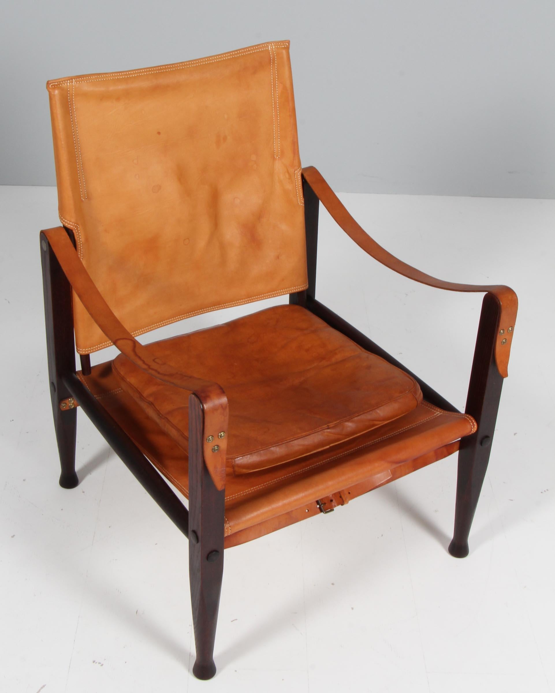 Kaare Klint for Rud Rasmussen. Safari chairs original patinated aniline leather. Straps maintained in the original patinated leather. 

Frame in solid ash.

Model Safari chair, made by Rud Rasmussen.
  