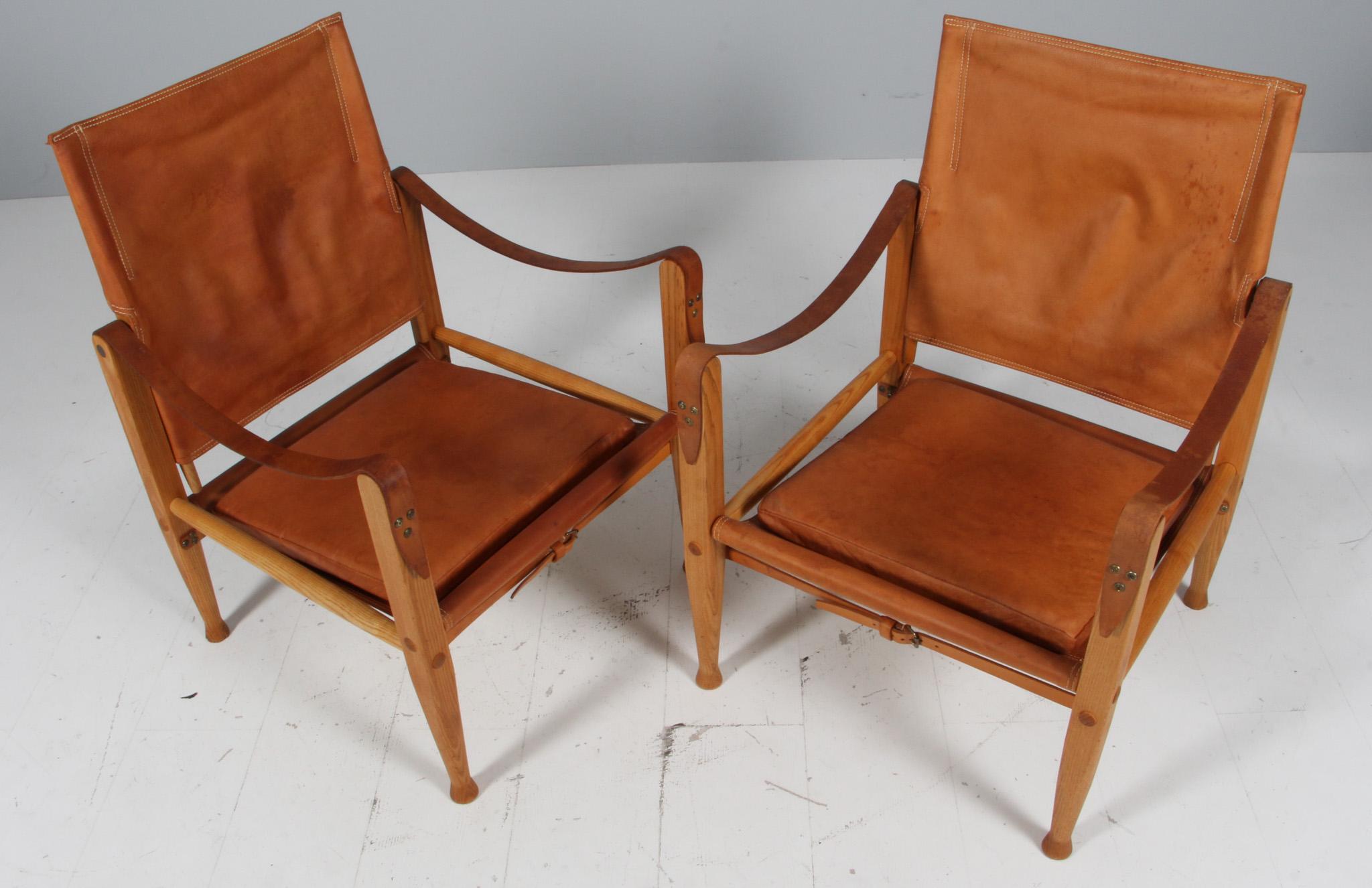 Kaare Klint for Rud Rasmussen. Safari chairs original patinated aniline leather. Straps maintained in the original patinated leather.

Frame in solid ash.

Model Safari chair, made by Rud Rasmussen.

Sold as single chairs