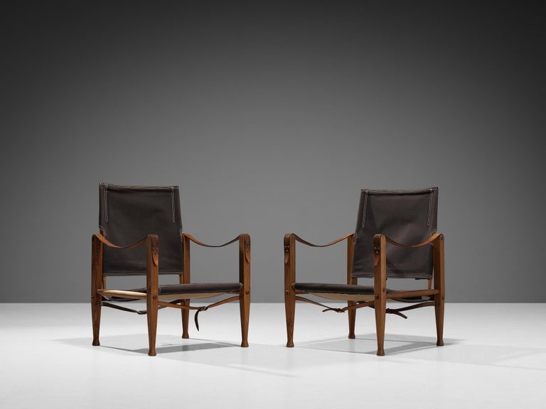 Kaare Klint for Rud Rasmussen, pair of safari chairs model 'KK47000', ash, canvas, metal, brass, leather, Denmark, designed in 1933 and produced in 1960s. 

The chair shows very elegant and well-designed lines, in combination with carefully