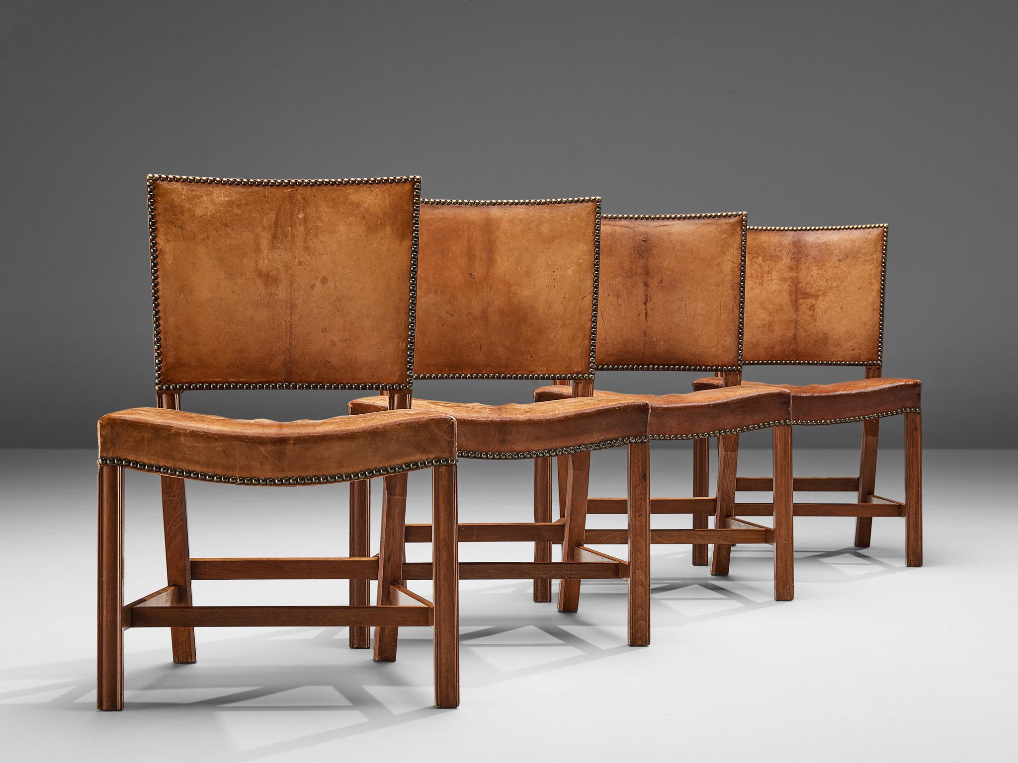 Kaare Klint for Rud Rasmussen, set of four dining chairs 'The Red Chair', model 3758, mahogany, original patinated Niger leather, brass nails, designed 1927, manufactured 1930s.

Set of four dining chairs, designed by Kaare Klint in 1927 and