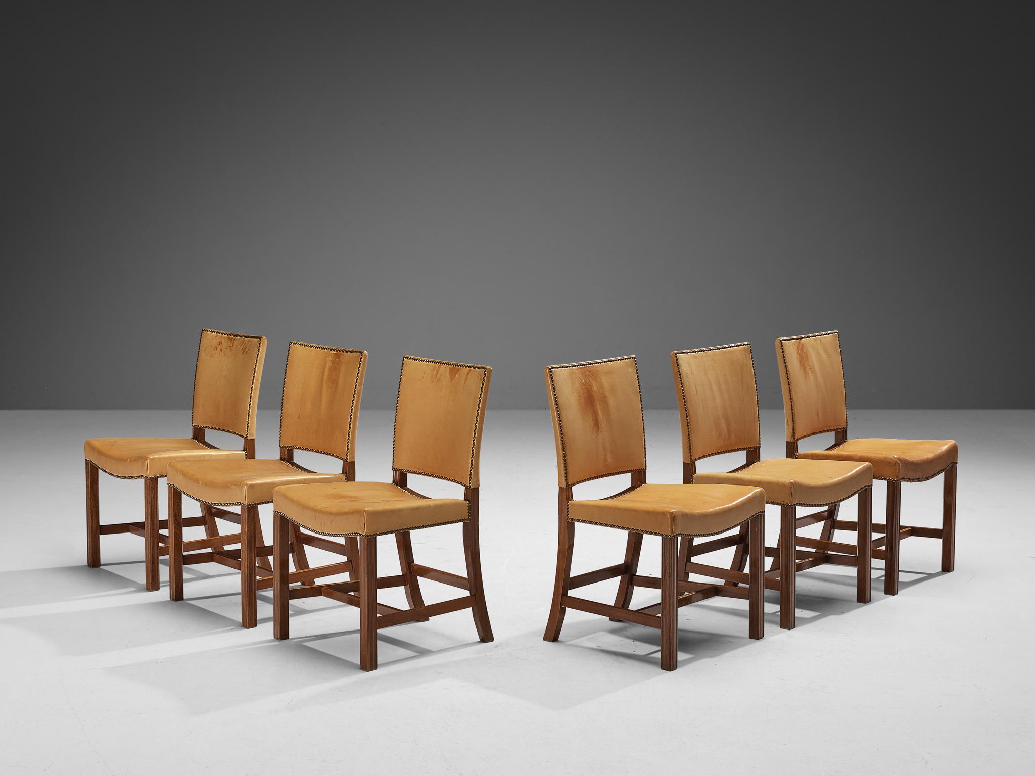 Kaare Klint for Rud Rasmussen, set of six dining chairs, 'The Red Chair', model 4751, original patinated leather, mahogany, brass Denmark, designed 1933, manufactured 1960s

These eloquent dining chairs in camel leather upholstery are designed in