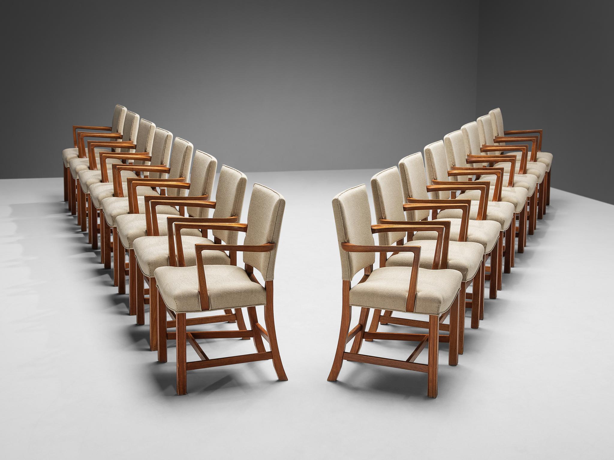 Kaare Klint for Rud Rasmussens Snedkerier, set of sixteen armchairs, model '3758A', teak, fabric, Denmark, design 1927. 

This large set of 16 dining chairs designed by Kaare Klint is special to come by. These chairs have very elegantly sculpted