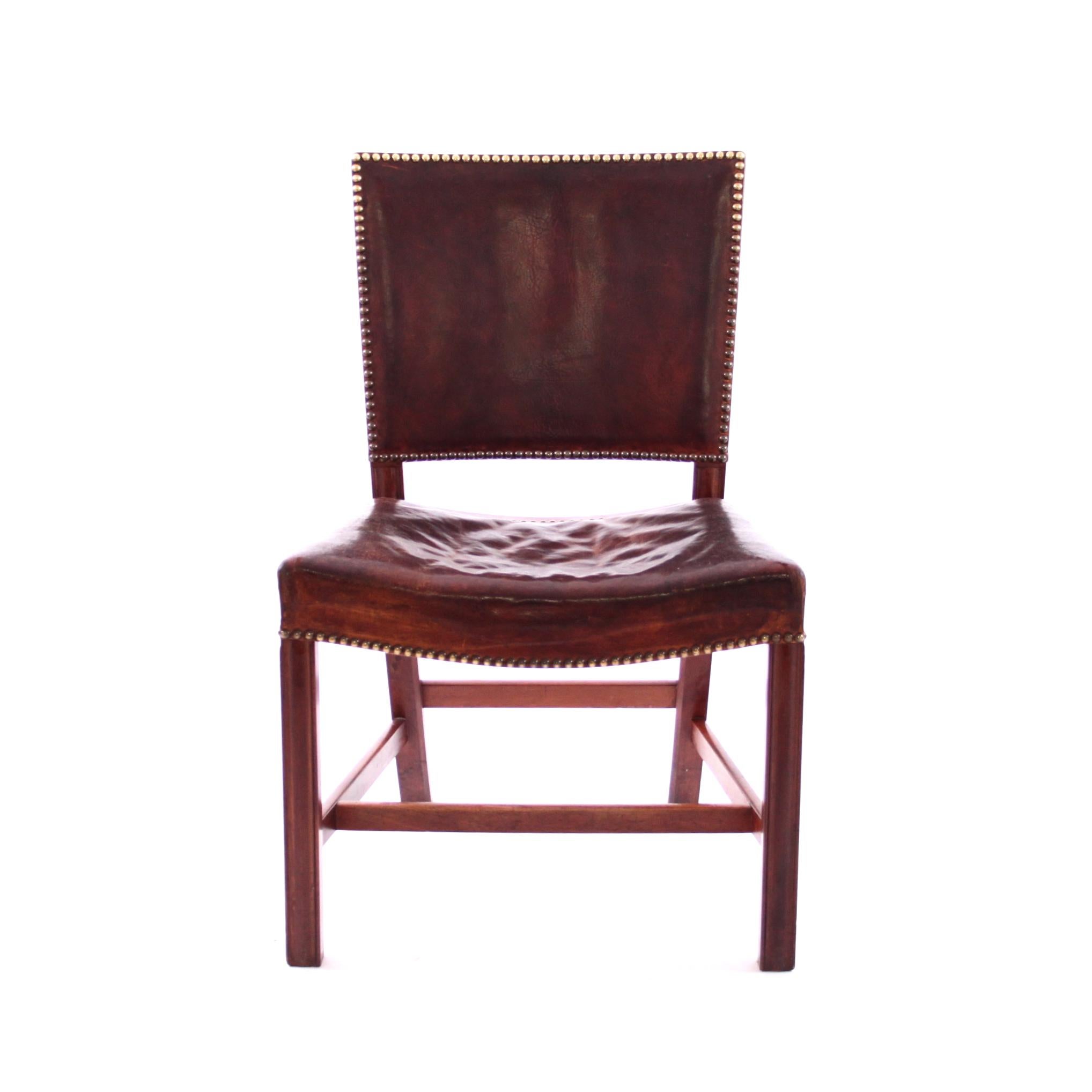 Kaare Klint & Rud Rasmussen Snedkerier - Scandinavian Modern

A beautiful early Kaare Klint red chair / Barcelona chair with mahogany frame, brass nails and original patinated Niger leather that the Kaare Klint red chairs are so famous