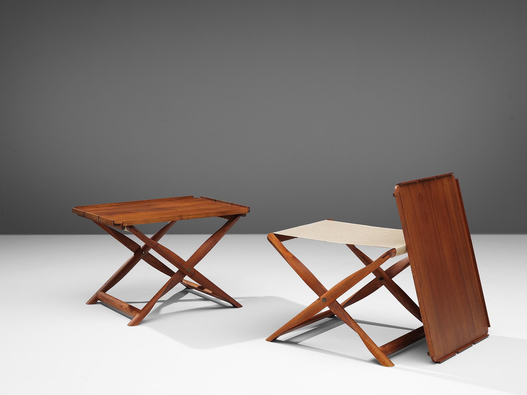 Kaare Klint for Rud Rasmussen, propeller stool and tray table, darkened ash and fabric, Denmark, 1960s.

Pair of propeller stools in ash with linen seats by Kaare Klint for Rud Rasmussen. Klint designed the concept for this stool in 1930 around the