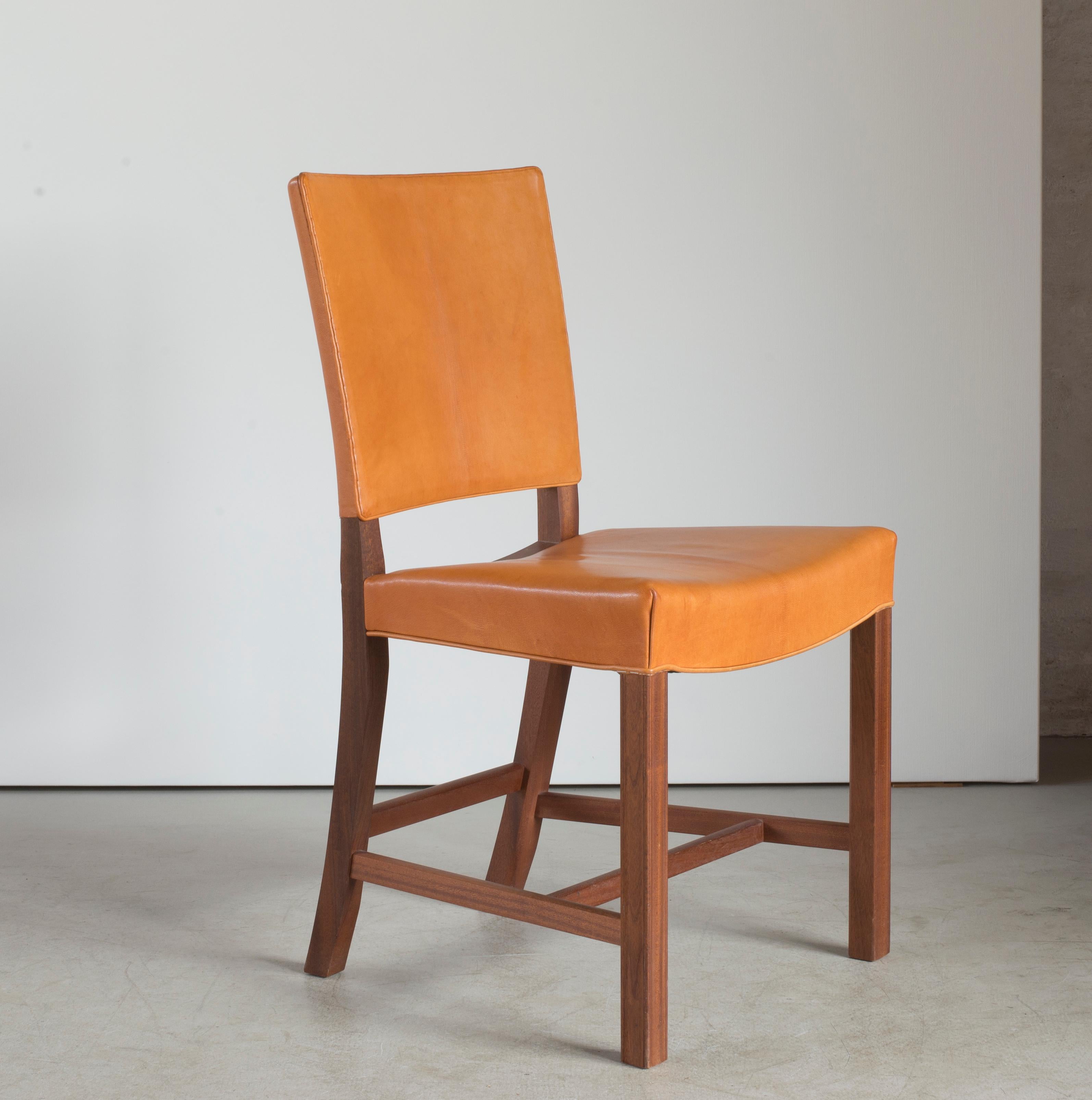 Kaare Klint red chair of mahogany and leather. Executed by Rud. Rasmussen.
   