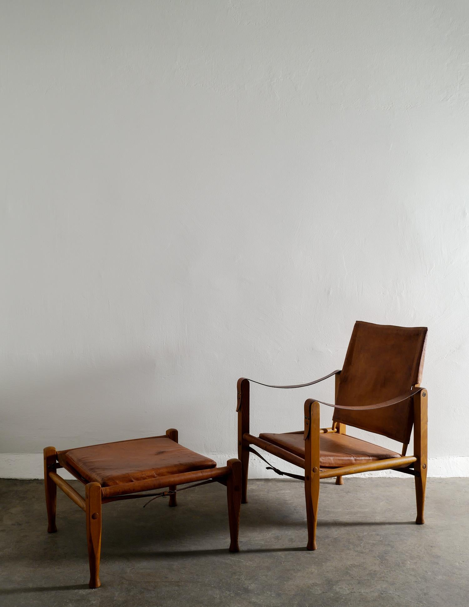 Rare mid-century safari lounge chair and ottoman designed by Kaare Klint and produced by 