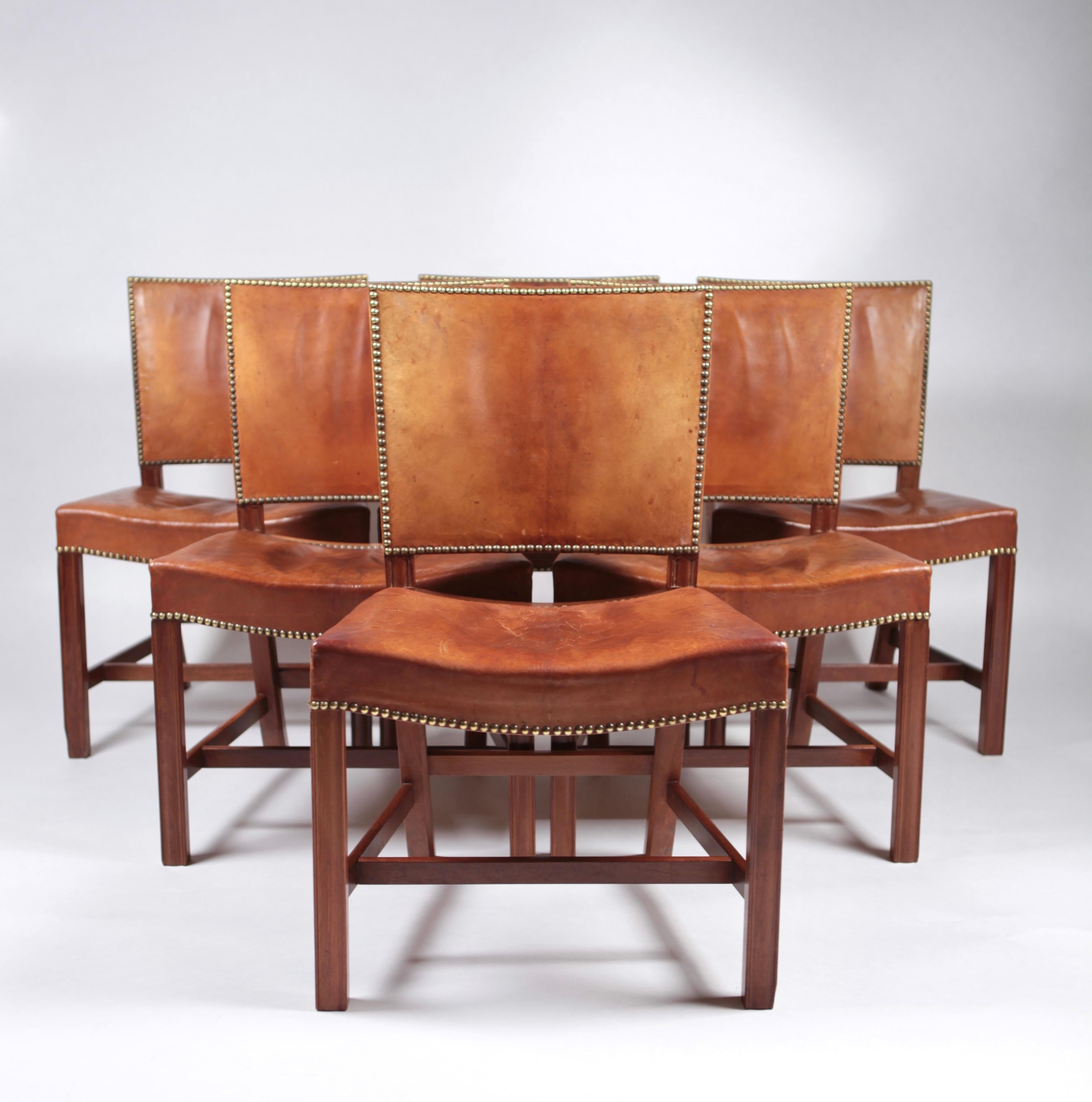 Kaare Klint,
A fantastic set of six 'Barcelona' dining chairs. Designed 1927
This set is manufactured 1932, in original, excellent condition, made of Cuban mahogany, Niger leather and brass nails.
Model 3758.
Executed by cabinetmakers Rud.