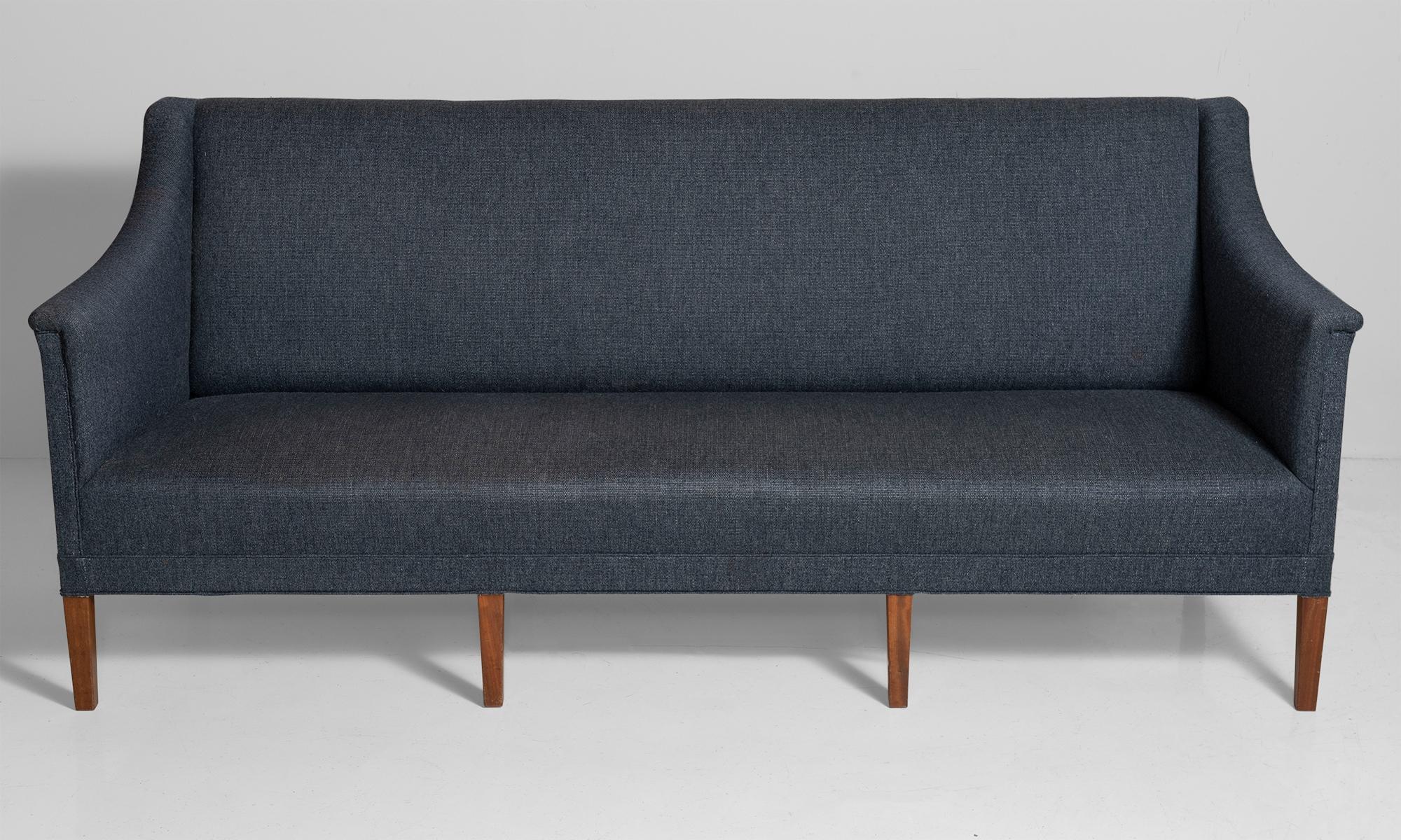 Model 6092 sofa with teak legs.