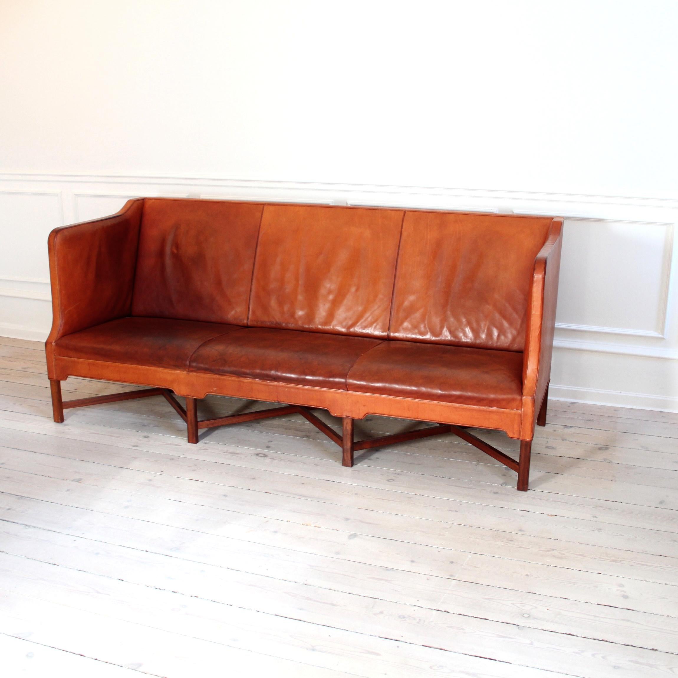 Kaare Klint & Rud Rasmussen Snedkerier, Denmark

The exquisite and rare three-seater X-base sofa, model 4118, by Danish designer Kaare Klint and executed by cabinetmakers Rud. Rasmussen A/S, Copenhagen, Denmark. 

The base consists of eight legs