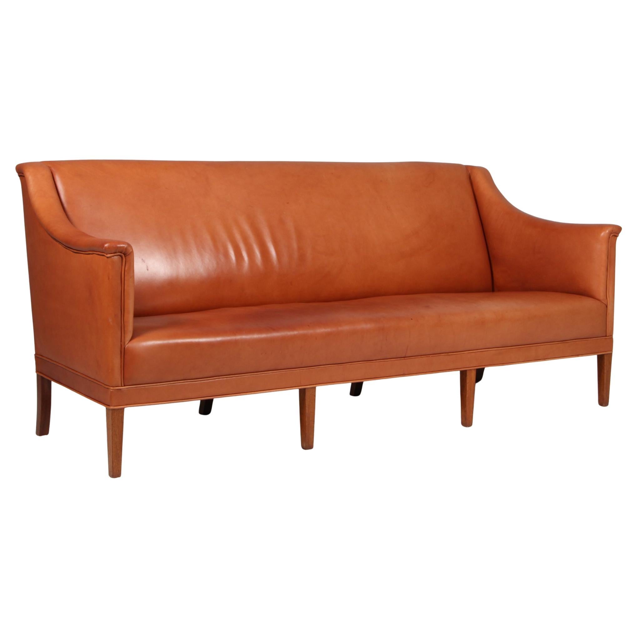 Kaare Klint Sofa, three seater, model 6092. Patinated tan leather.