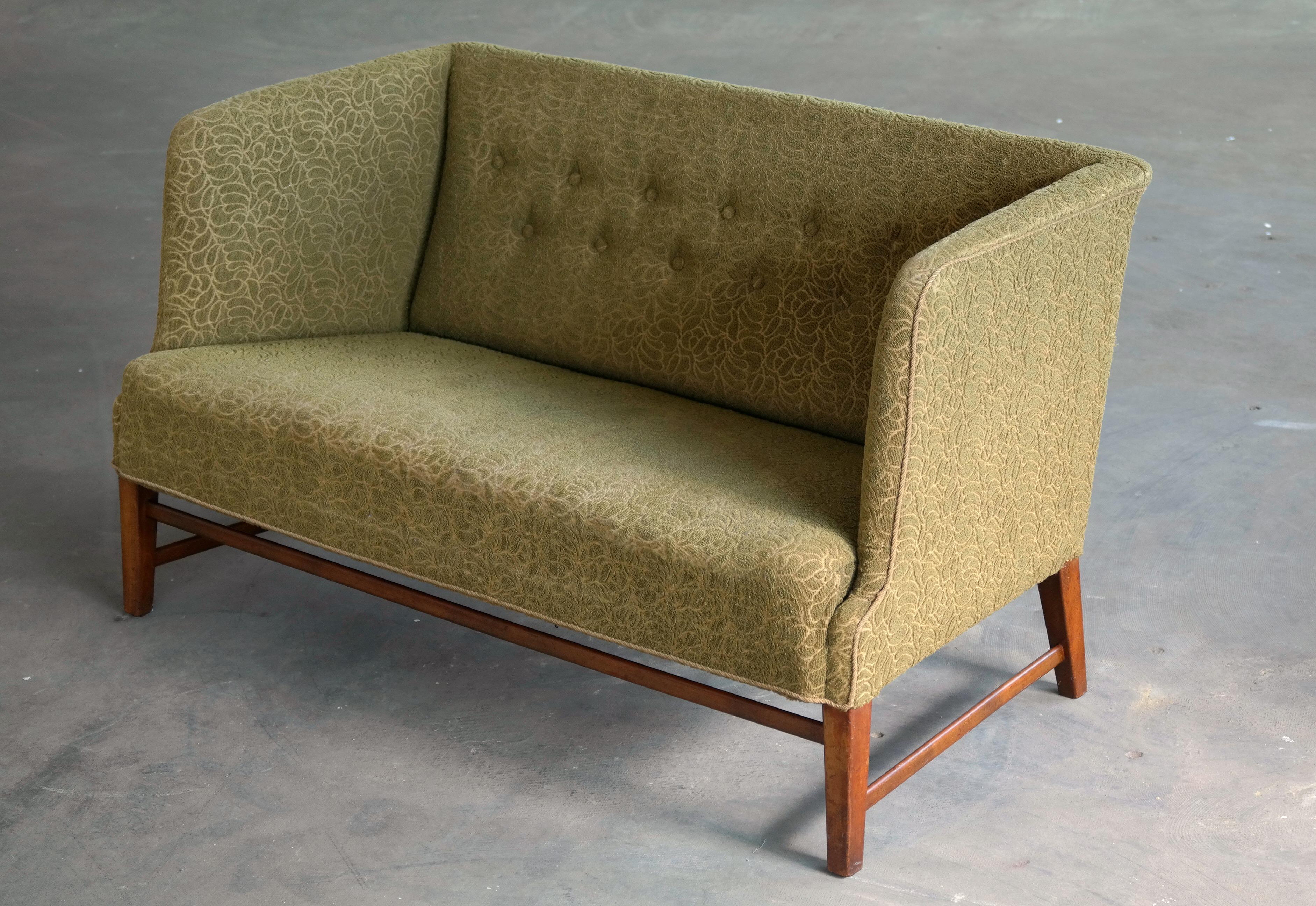 Great and rare Danish Settee from, circa 1938 attributed to Master Carpenter, Georg Kofoed of Copenhagen and similar in style to some of Kaare Klints earlier designs with slightly high sides and legs with stretchers for support. High quality sturdy