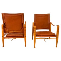 Kaare Klint The Safari Chair une paire en cuir cognac signée Rud. Rasmussen