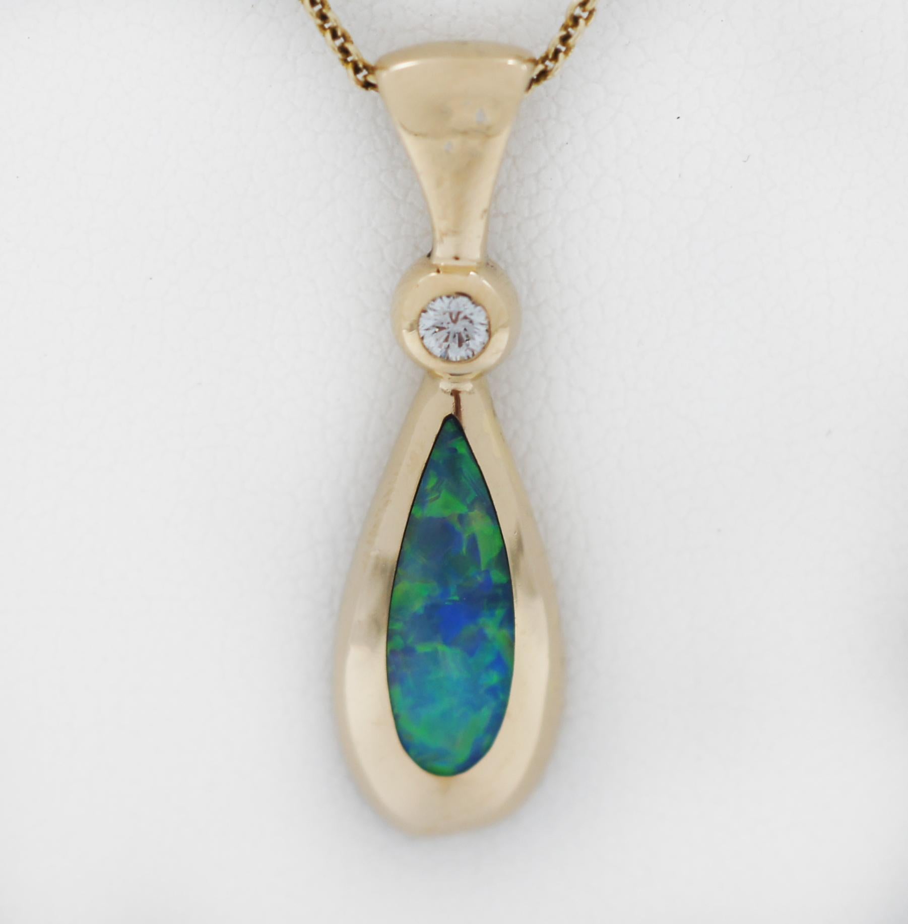 KABANA
14K Yellow Gold
Teardrop Pendant
With Single Diamond and Opal Inlay.
20