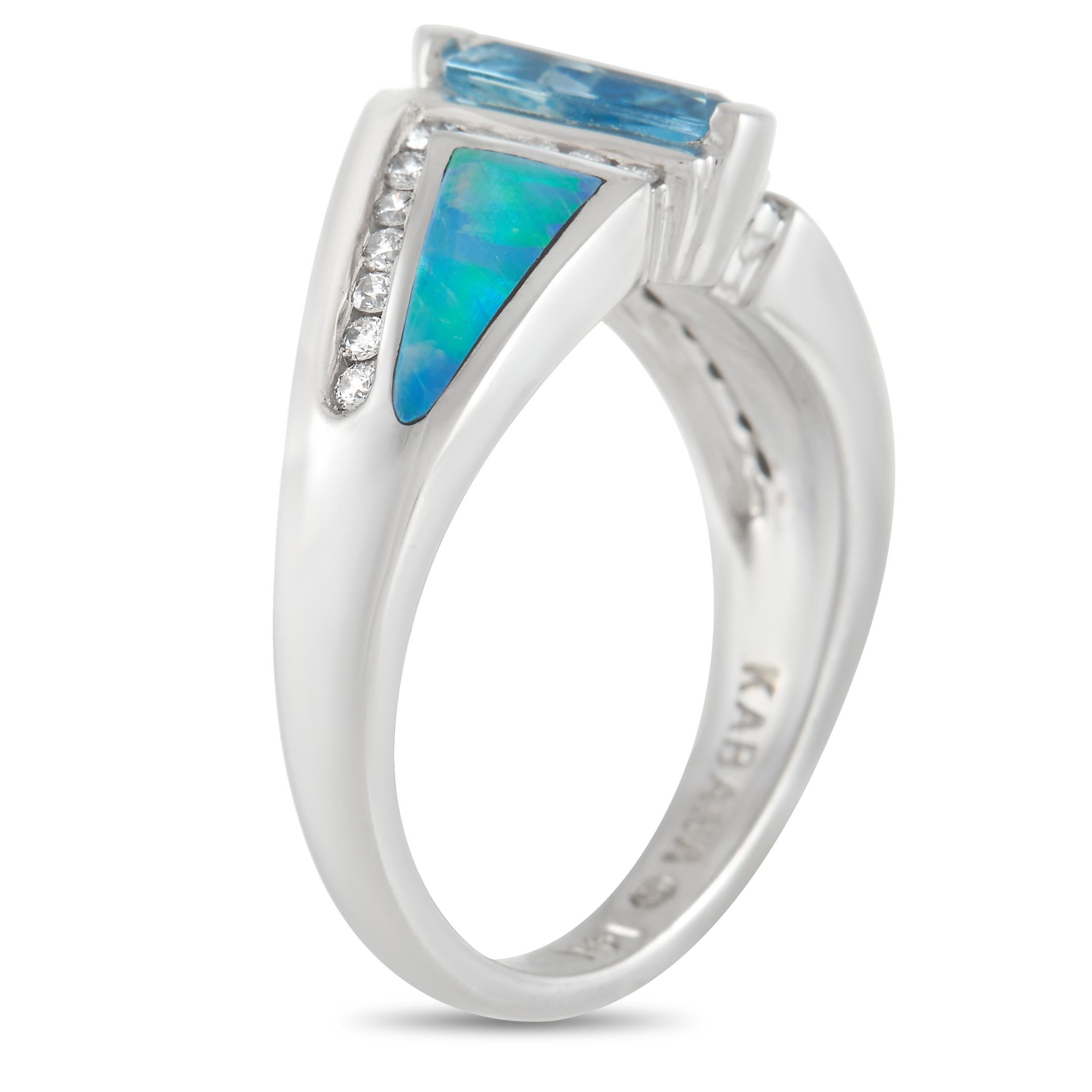 You’ve never seen anything quite as striking as this ring from Kabana. The 14K White Gold setting’s geometric design comes to life thanks to the 0.90 carat Aquamarine center stone. Adorned with diamond accents and inlaid opal, this piece features a