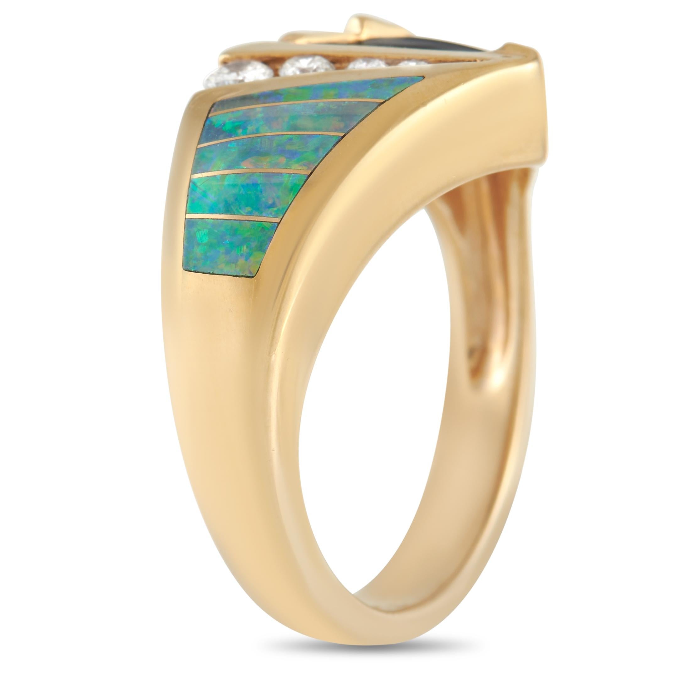 This creative Kabana ring will continually make a statement. The bold 14K Yellow Gold band features a 3mm wide band and a 4mm top height. It’s accented by fiery inlaid opal, 1.20 carats of green tourmaline, and 0.15 carats of diamonds at the center.