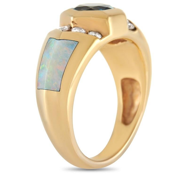 This 14K Yellow Gold ring from Kabana is the picture of contemporary elegance. The striking 14K Yellow Gold setting comes to life thanks to a 0.60 carat blue Topaz center stone. You’ll also find 0.30 carats of glittering diamonds and inlaid opal