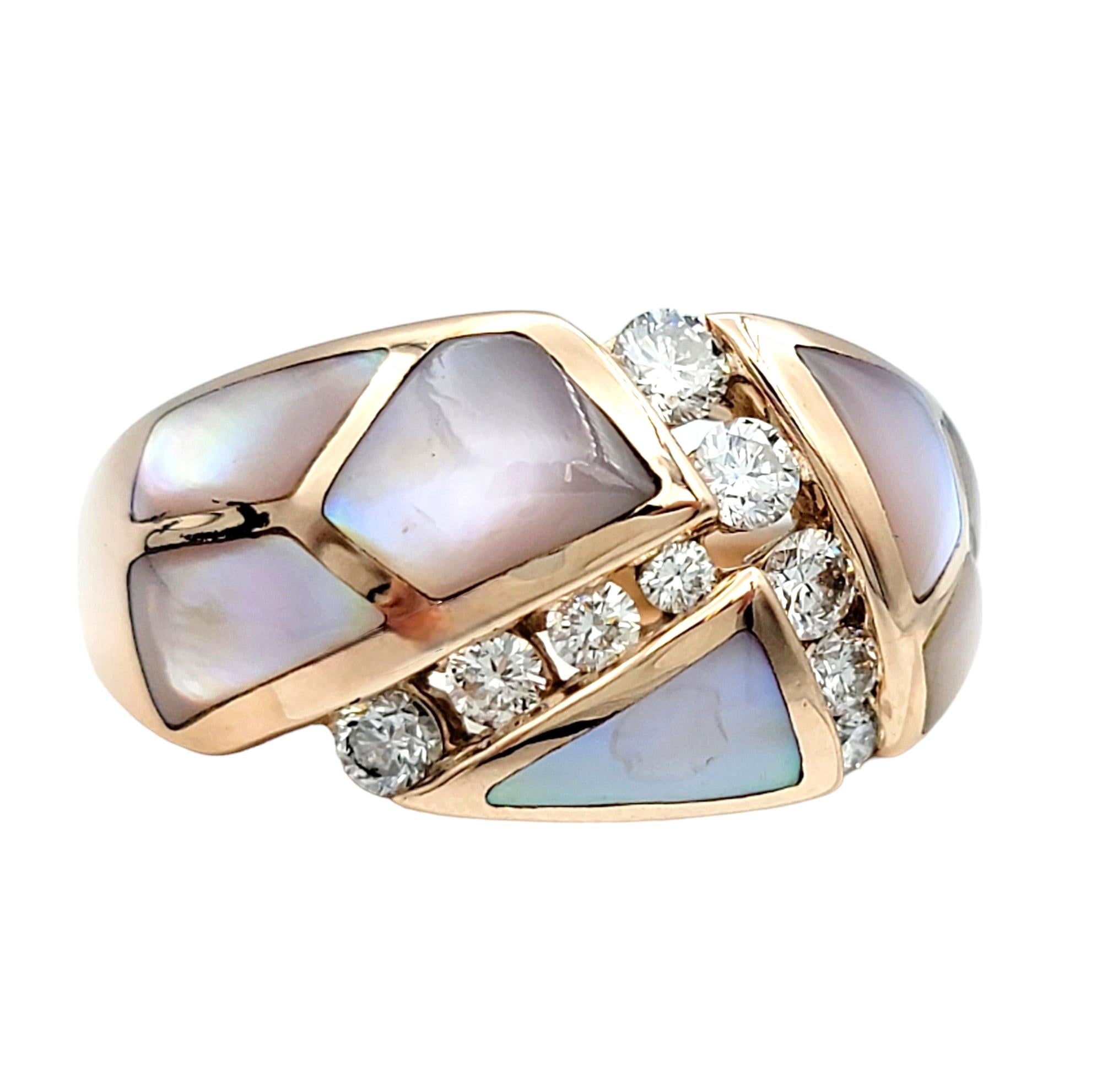 Ring Size: 7.75

This stunning band ring set in 14 karat rose gold features a distinctive asymmetrical design that catches the eye with its unconventional elegance. The rose gold setting provides a warm and luxurious backdrop for the arrangement of