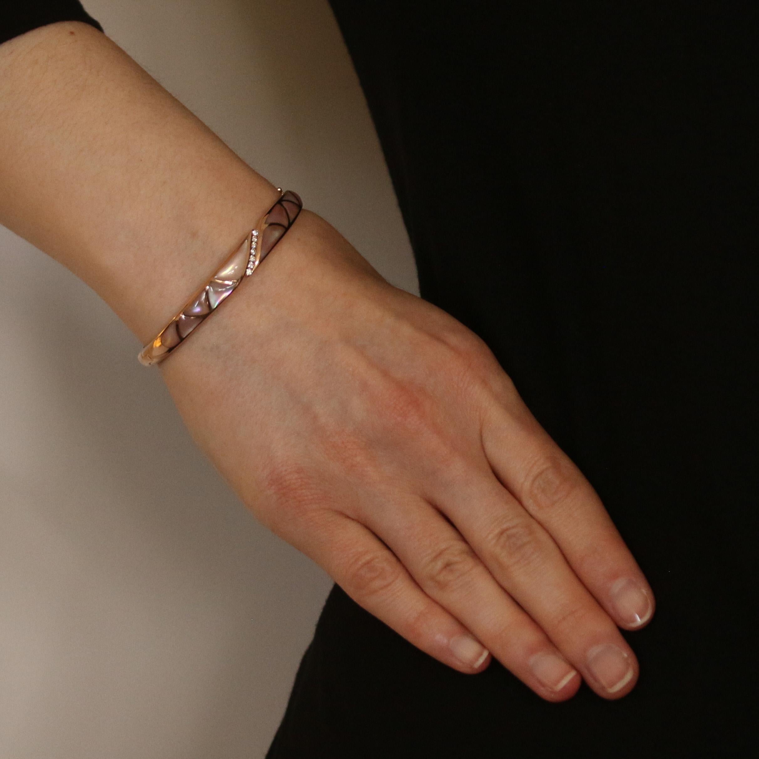 Originally retailing for $7475, this fabulous designer bracelet is being offered here for a much more wallet-friendly price.

Brand: Kabana
Style Number: NBRC900MP

Metal Content: 14k Rose Gold 

Stone Information: 
Genuine Mother of Pearl
Color: