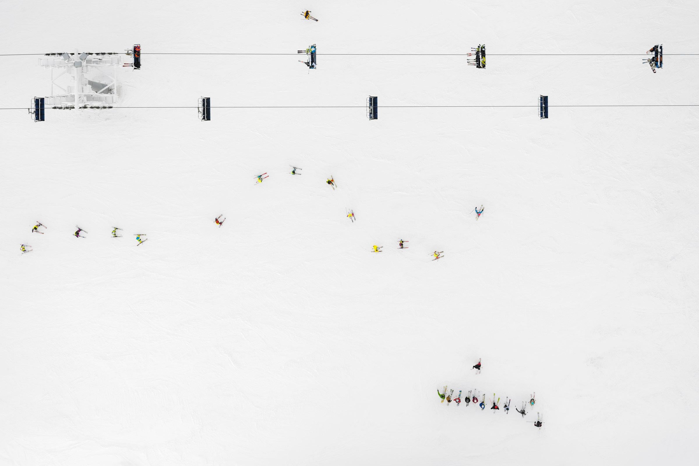 Kacper Kowalski Abstract Photograph - Side Effects, Depth of Winter, Skiers 02, abstract aerial landscape photograph