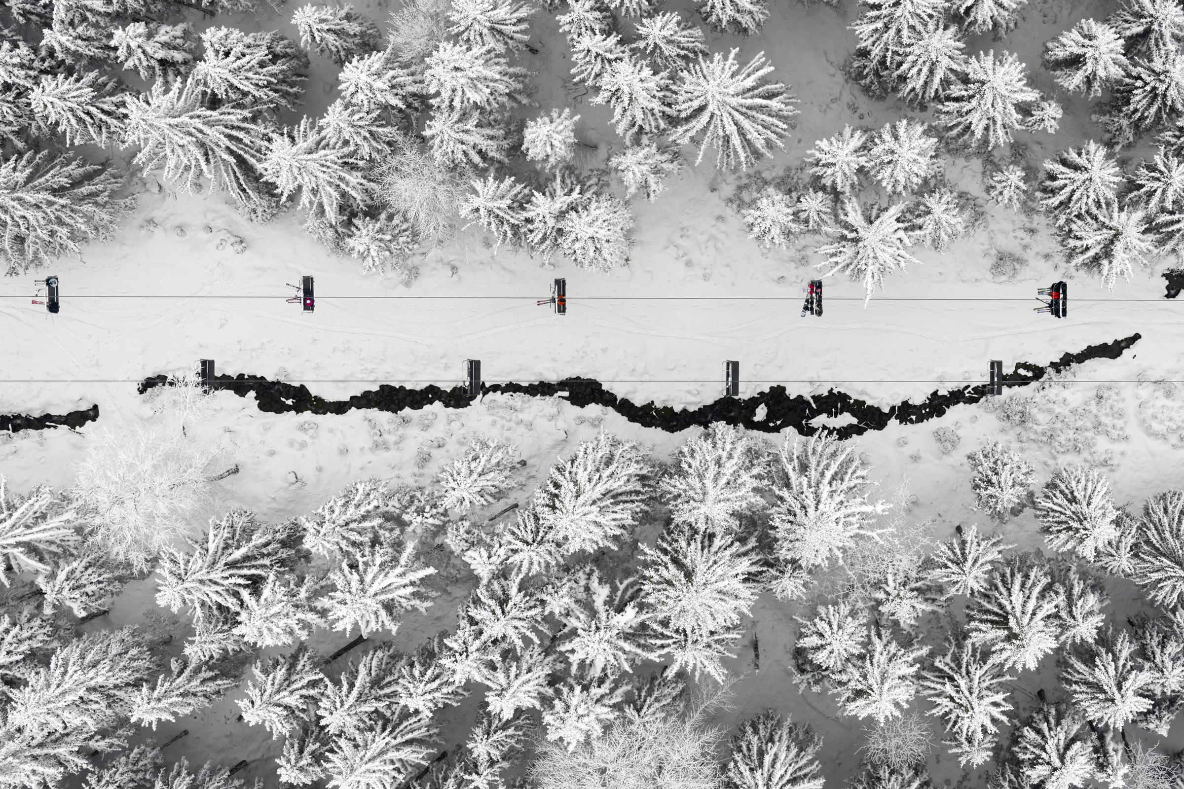 Kacper Kowalski Abstract Photograph - Side Effects, Depth of Winter, Skiers 04, abstract aerial landscape photograph