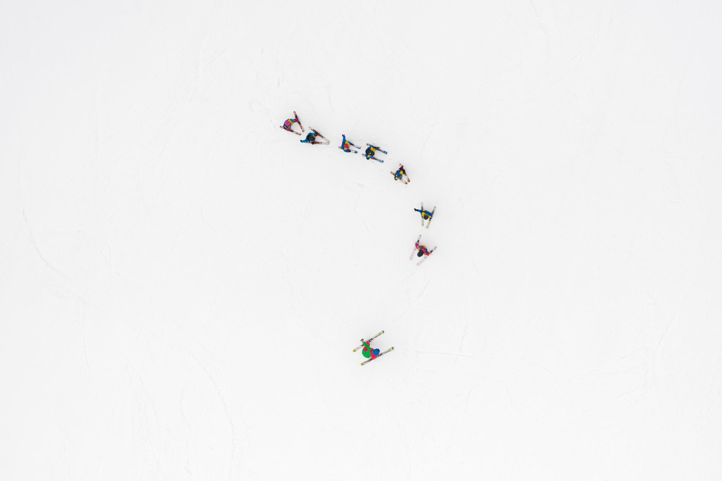 Kacper Kowalski Abstract Photograph - Side Effects, Depth of Winter, Skiers 06, abstract aerial landscape photograph
