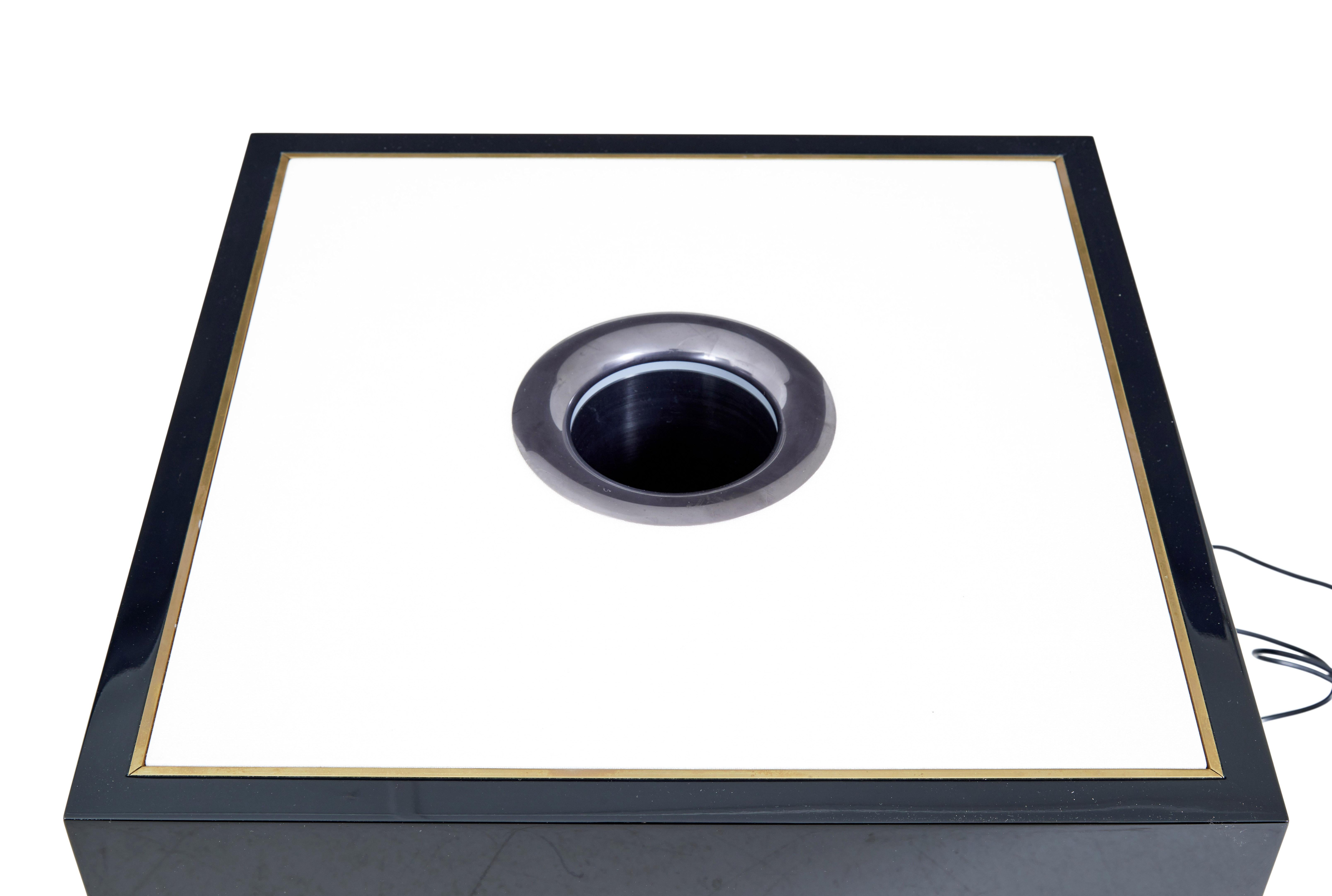 Kaelo wine cooler fitted occasional table circa 2010.

Here we offer a unique bar side table that was custom made to showcase the potential uses and design ideas for the kaelo wine chiller.

This piece would be ideal in a games room or in a bar,