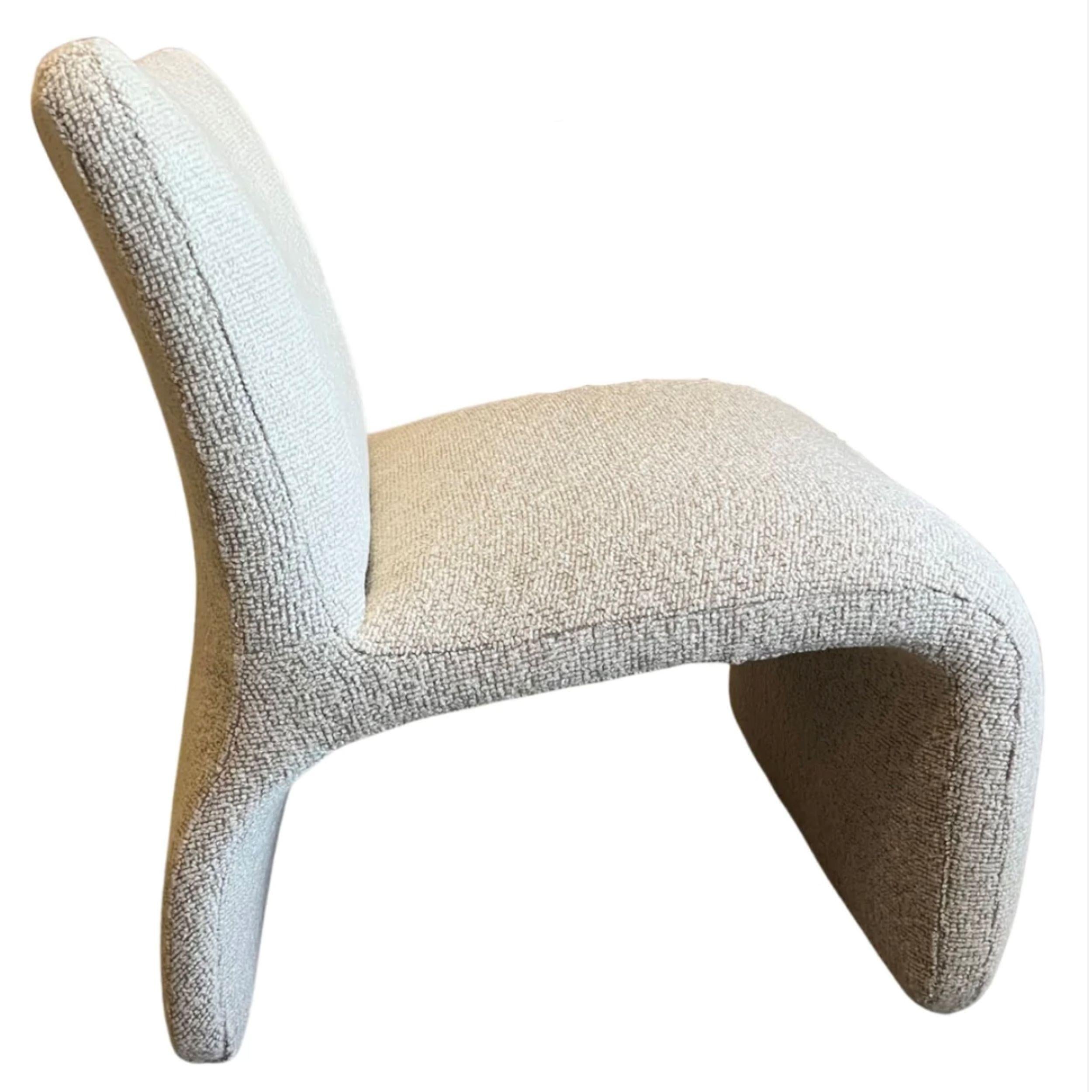 This is a pair of sculptural lounge chairs.

Attributed to Vladimir Kagan (Designer) & manufactured by Weiman Preview Furniture
1980's

The chairs were just reupholstered with a beautiful, neutral, Oatmeal Tones Fabric

The shapes are very