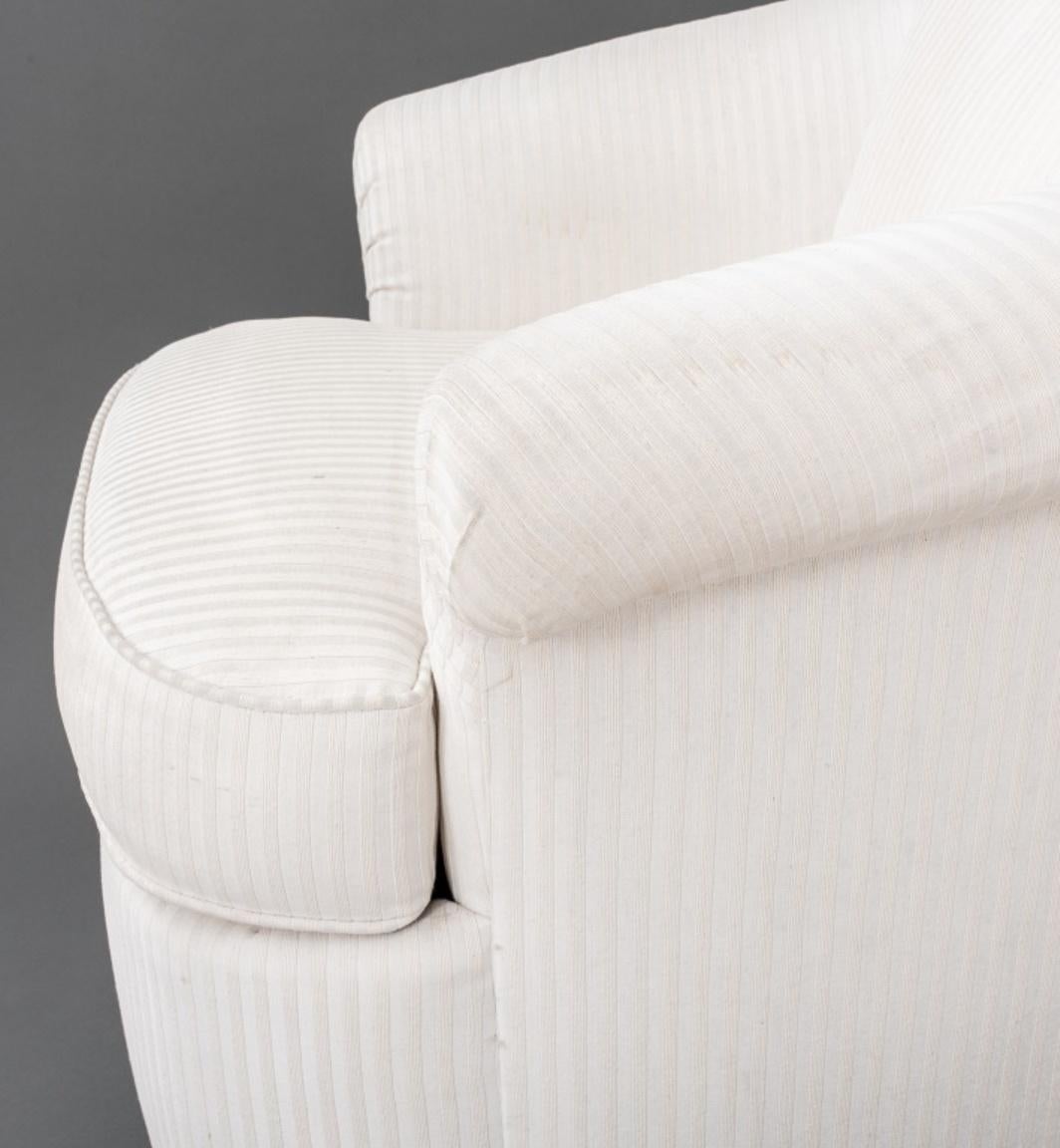 Contemporary Kagan Manner Cream Upholstered Swivel Armchair