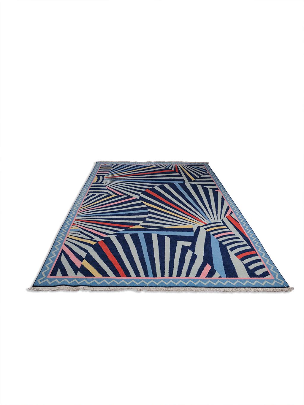 Abou the rug:
This hand-knotted rug has 160,000 knots per square meter, a double knot construction, and is made of 100% New Zealand wool for the face yarn and 100% Egyptian cotton for the warp and weft. The pile height is about 8mm and it weighs