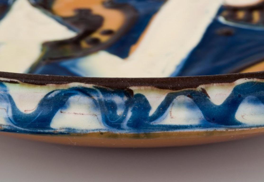 Glazed Kähler ceramic dish in cow horn technique. Abstract motif. Ca 1930s For Sale