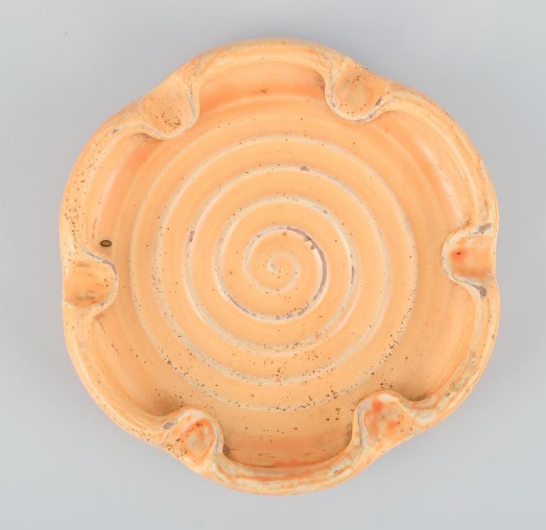 Danish Kähler ceramic dish in uranium glaze. Spiral-shaped motif. Approx. 1930 For Sale